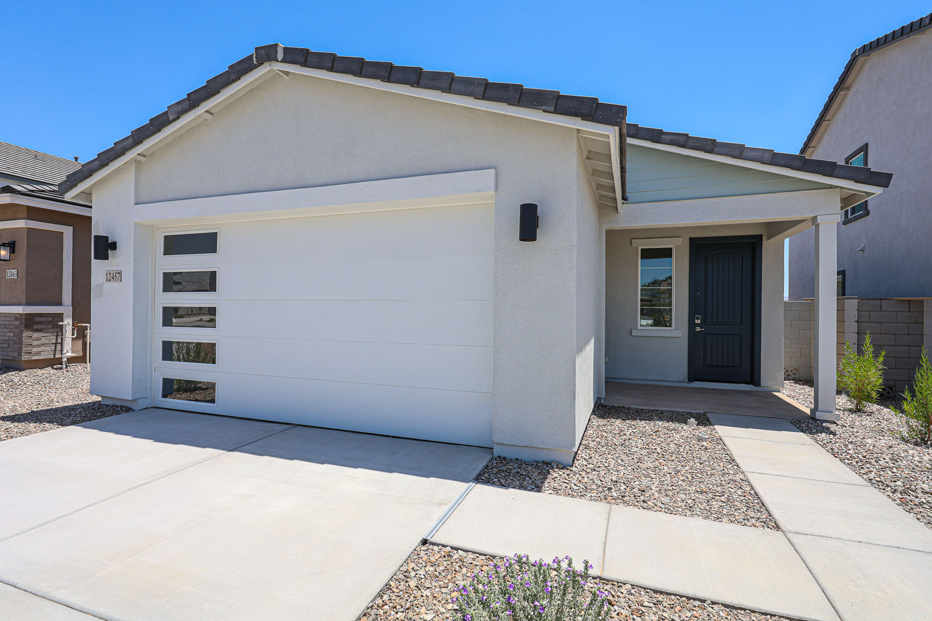 A white garage with a garage.