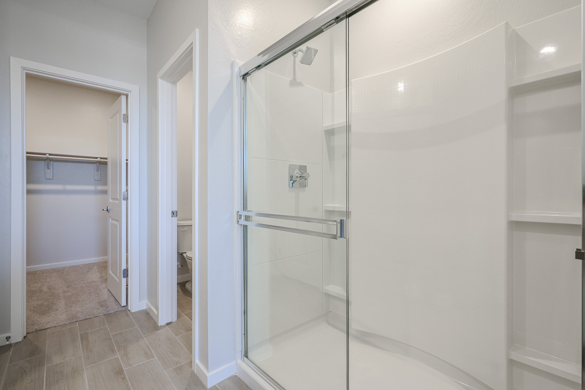 A shower unit in a bathroom.
