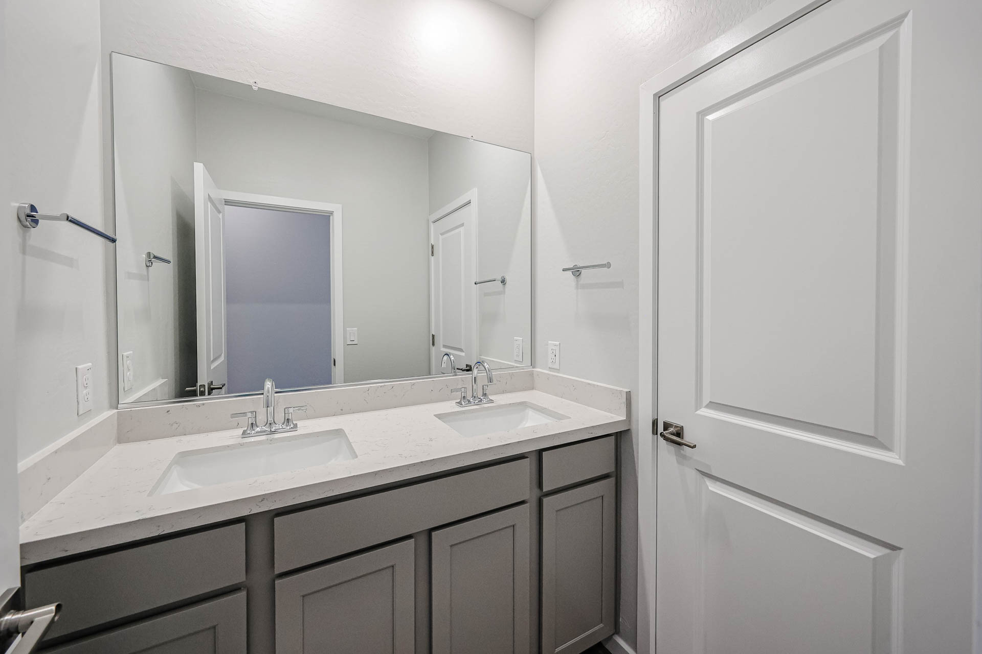 A bathroom with two sinks.