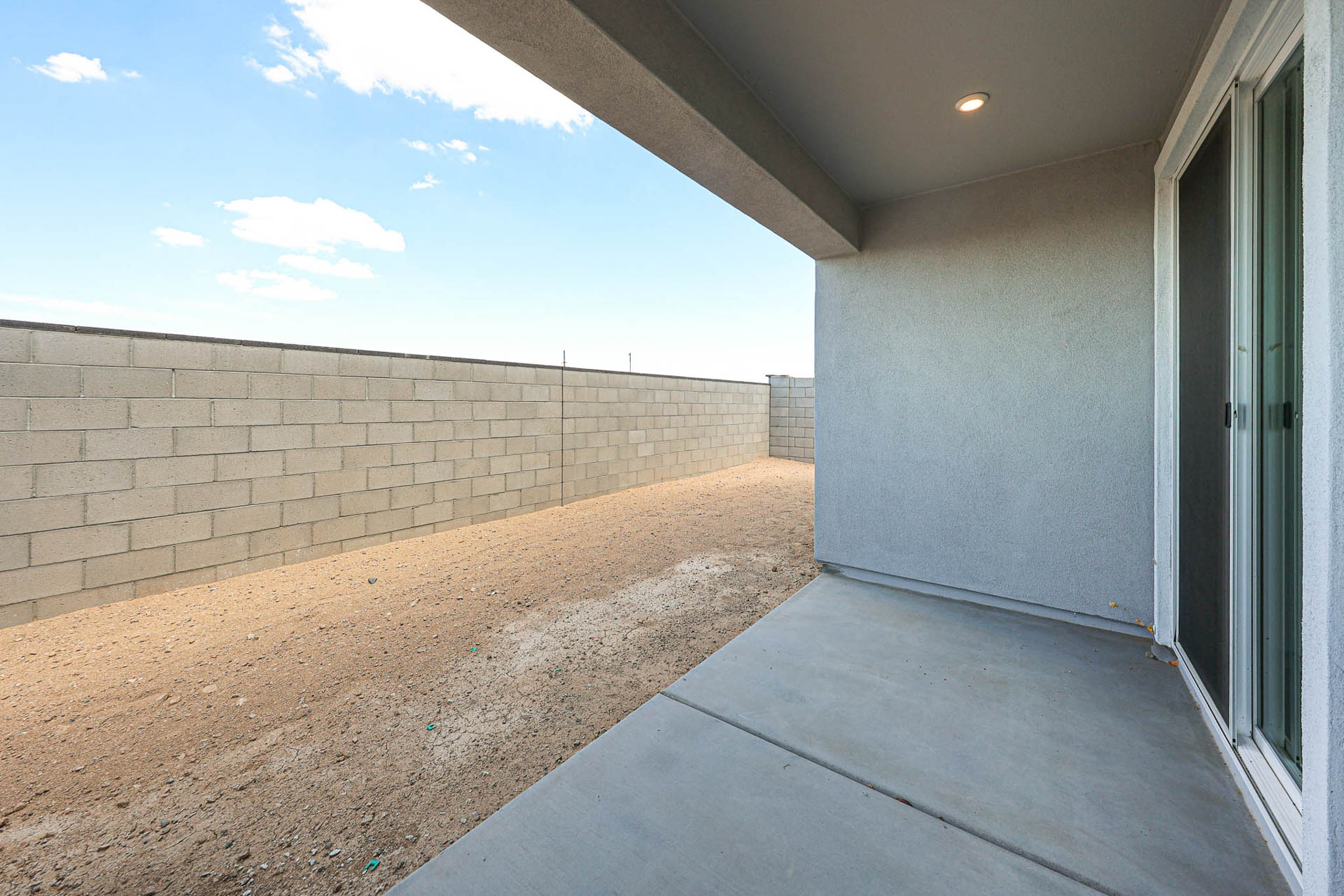 A concrete wall and a brick wall.