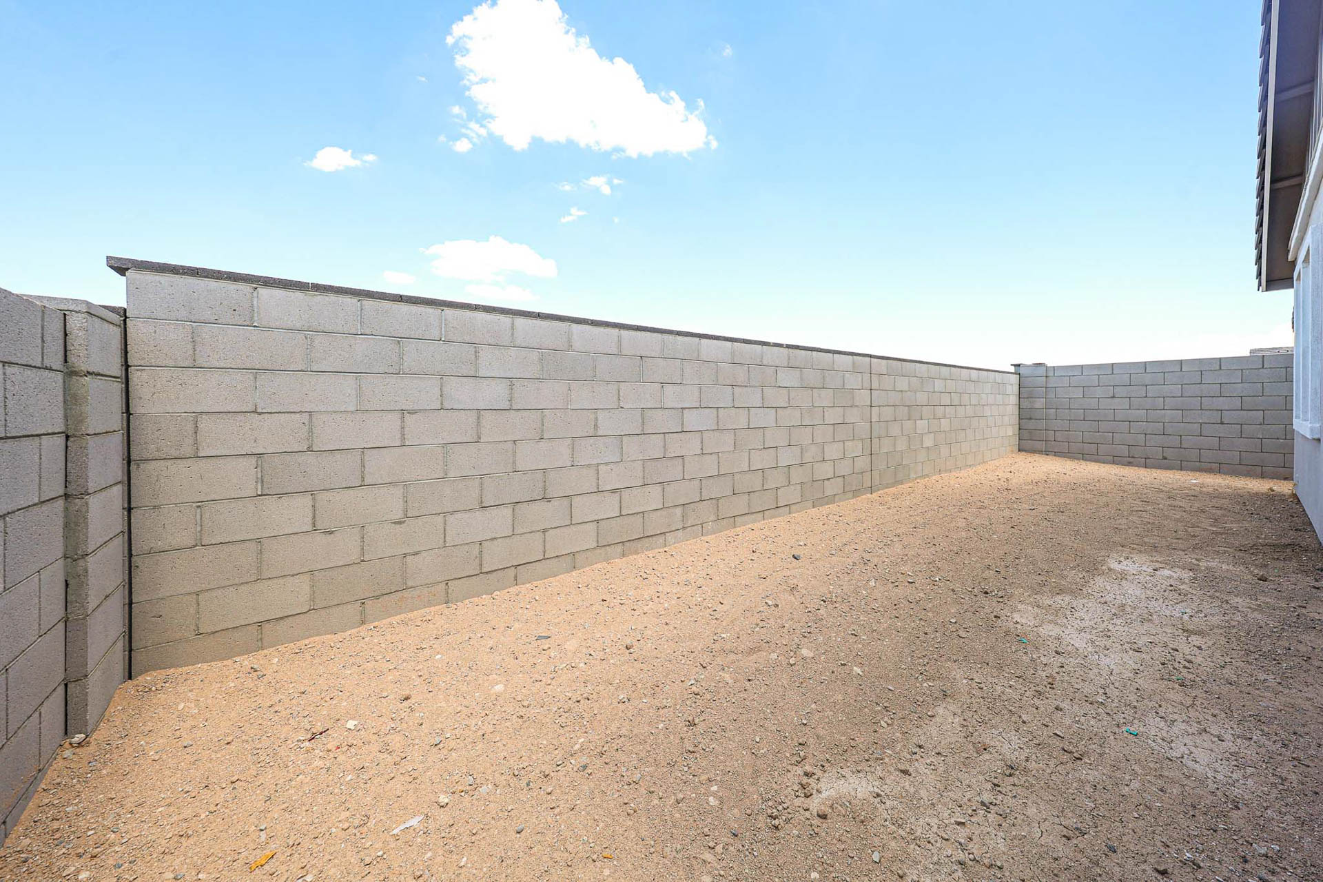 A wall with a brick wall.
