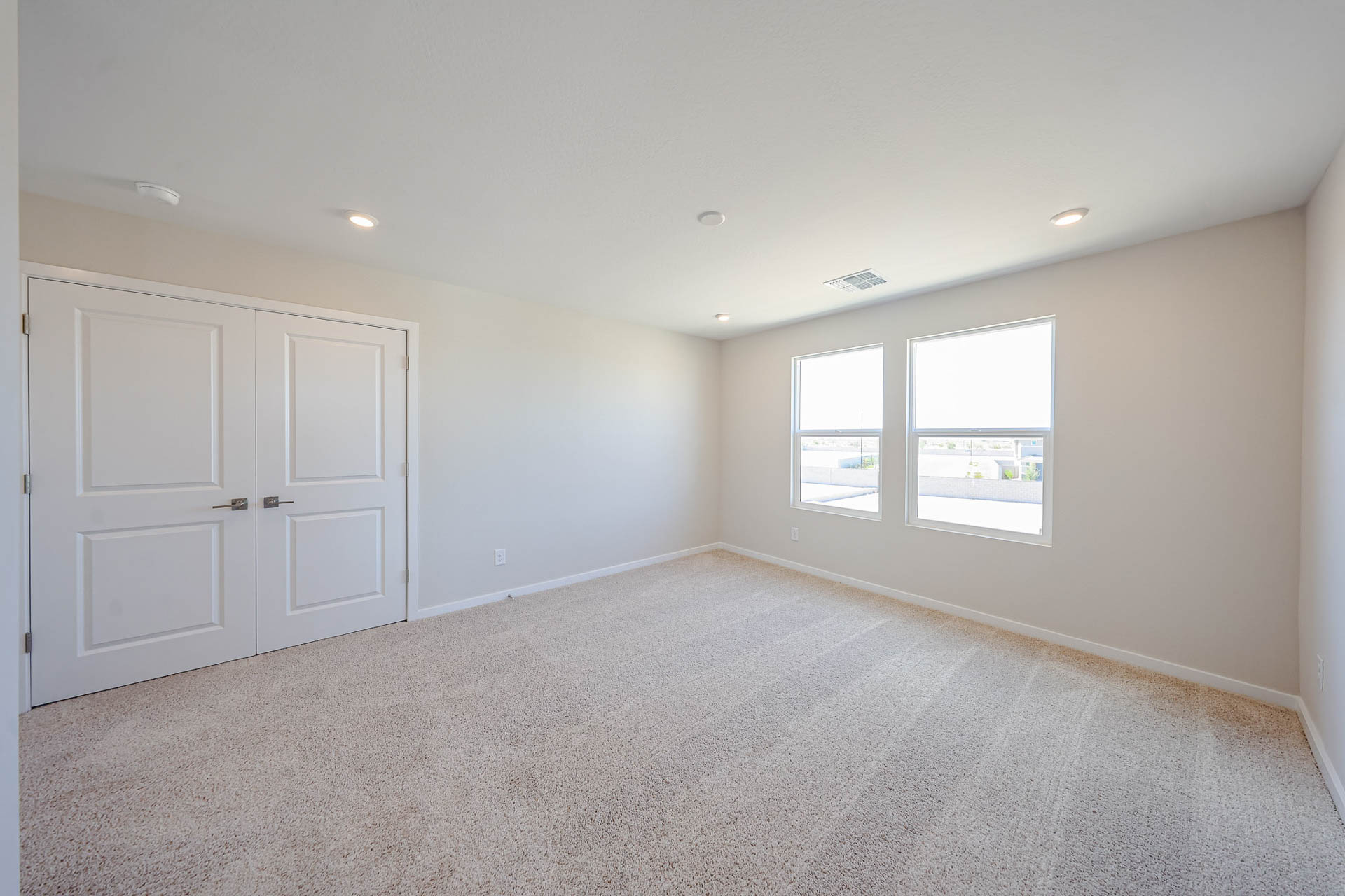 A room with white doors.