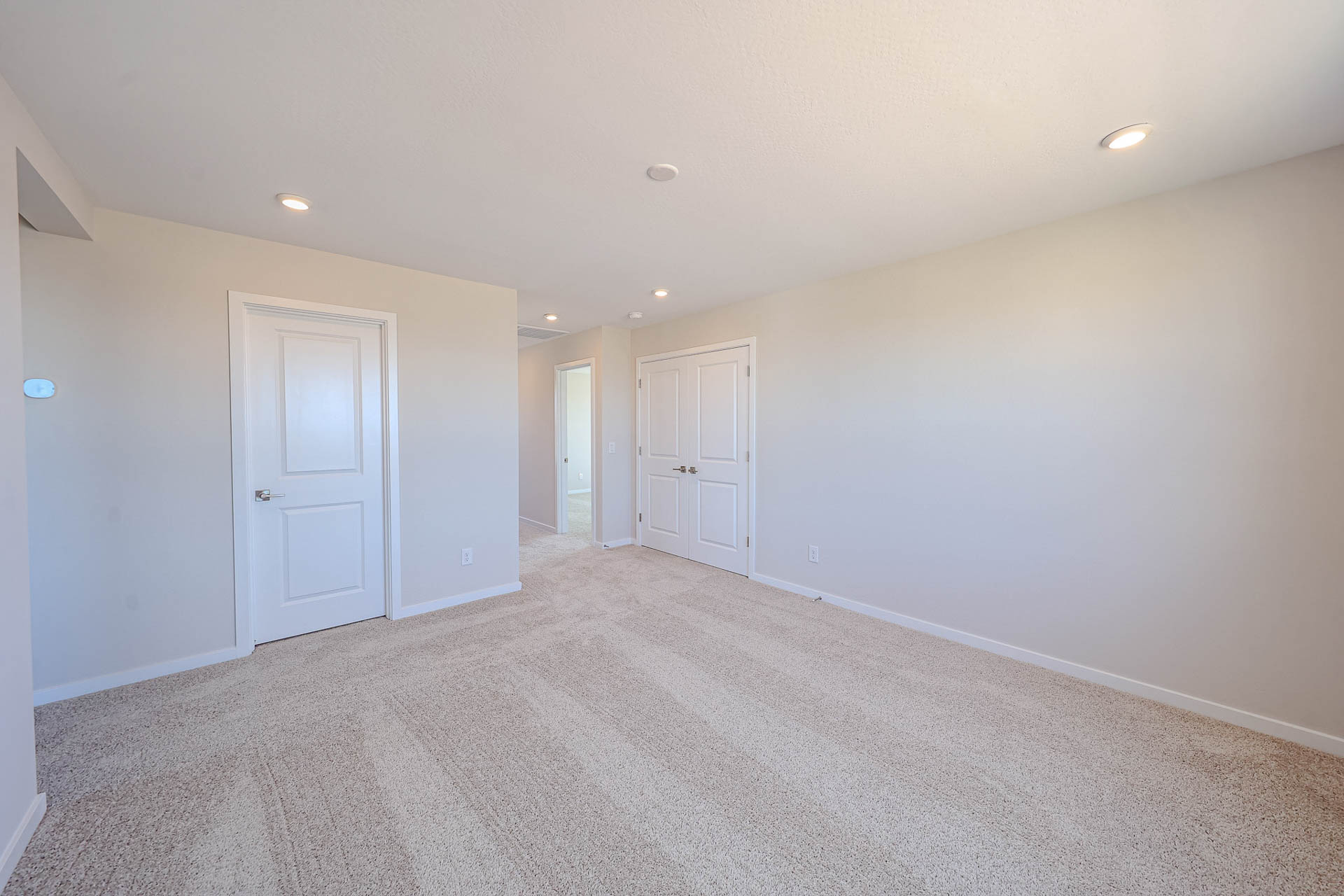 A room with white doors.