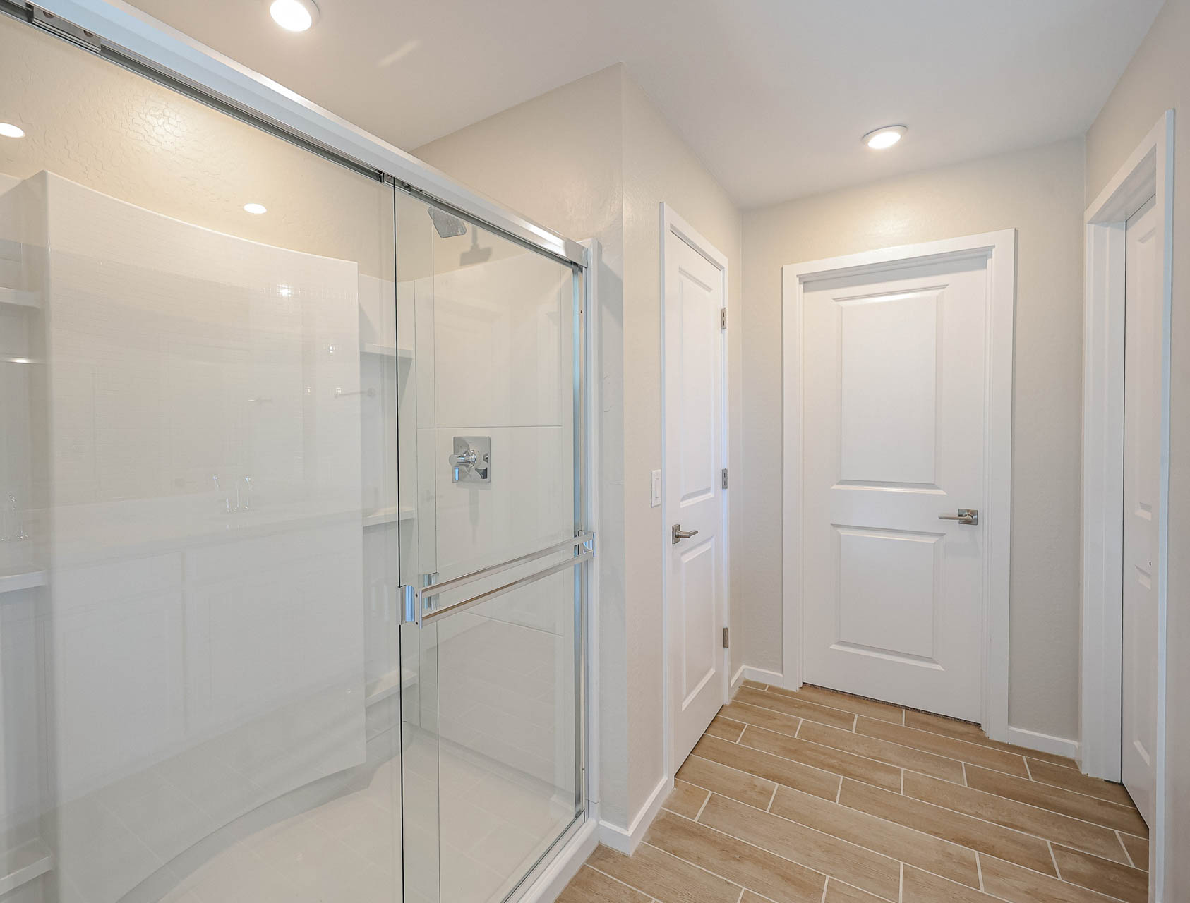 A room with white doors.