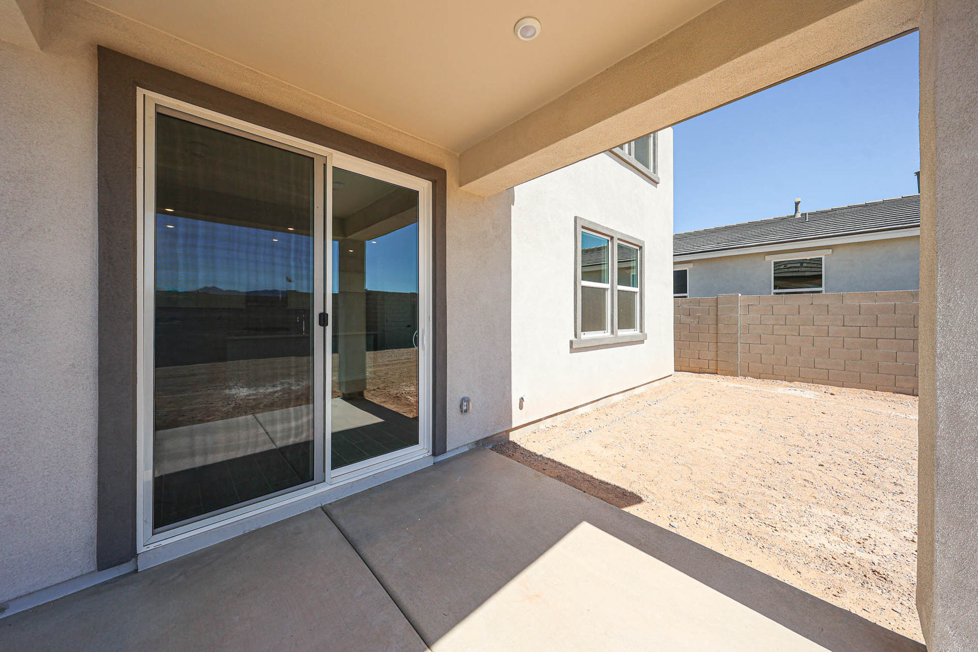 A room with a glass door.