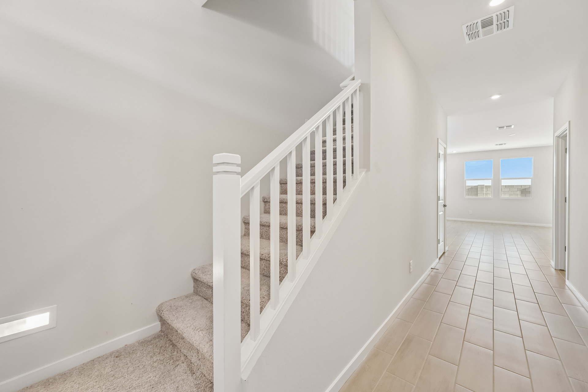 A white staircase in a house.
