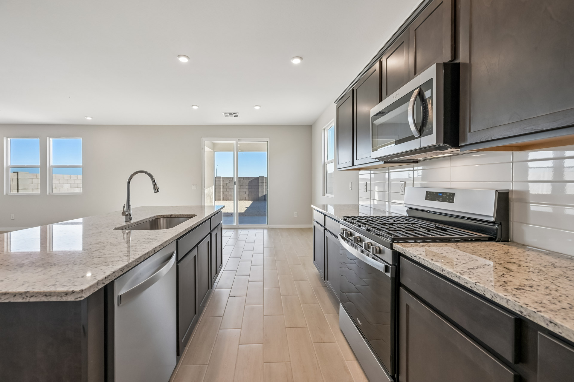 A kitchen with stainless steel appliances.