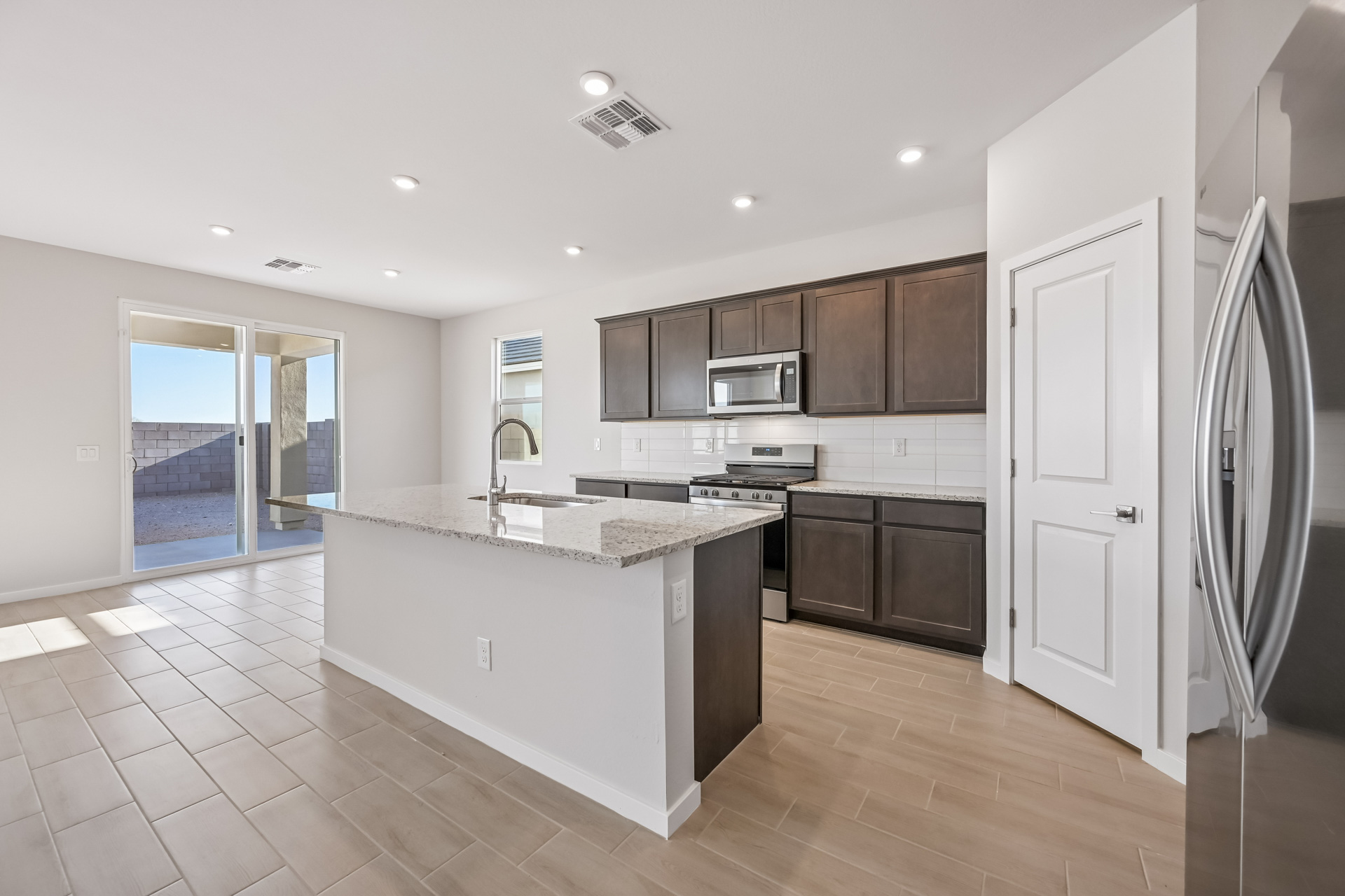 A kitchen with a large island.