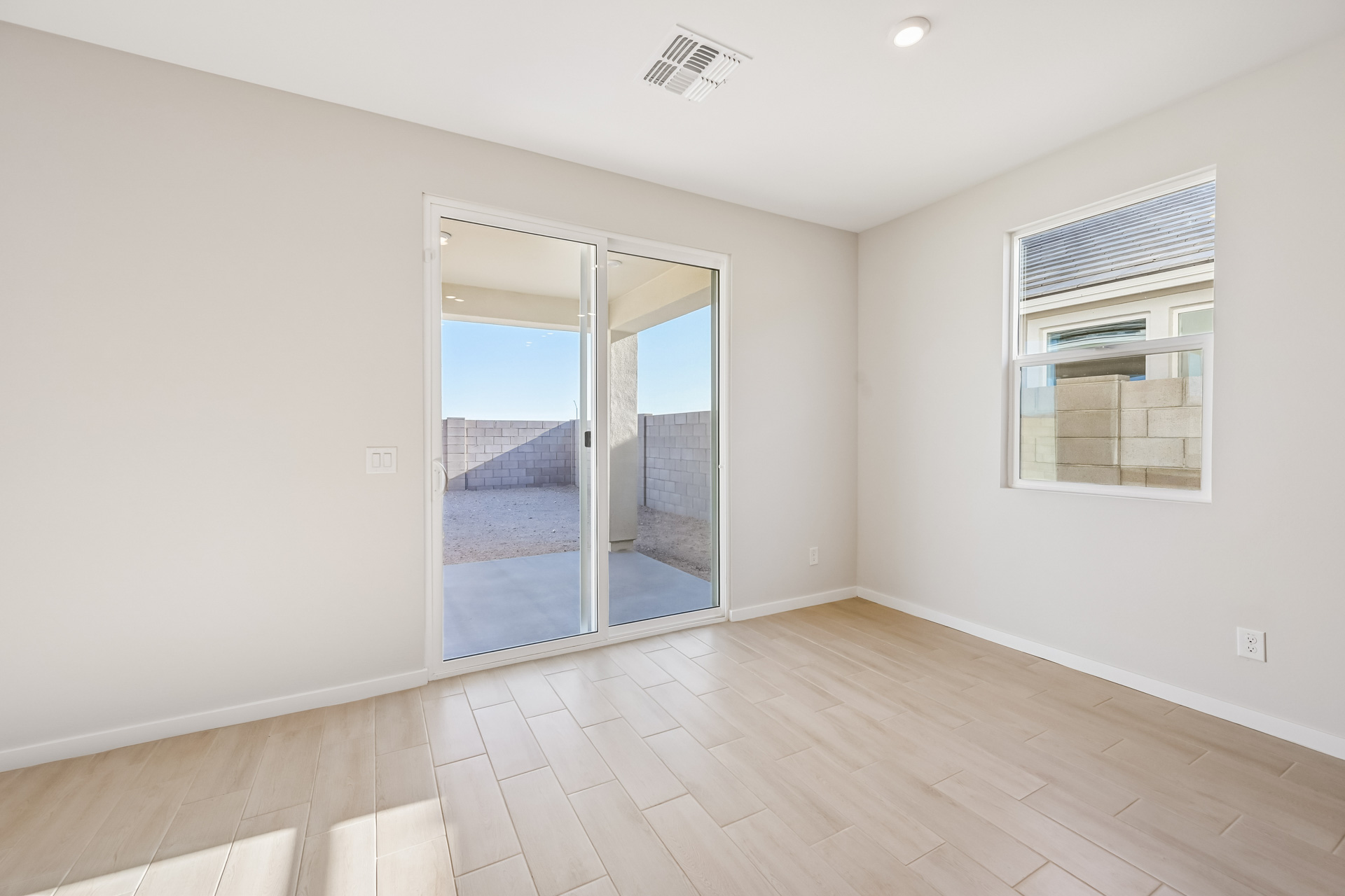 A room with a glass door.