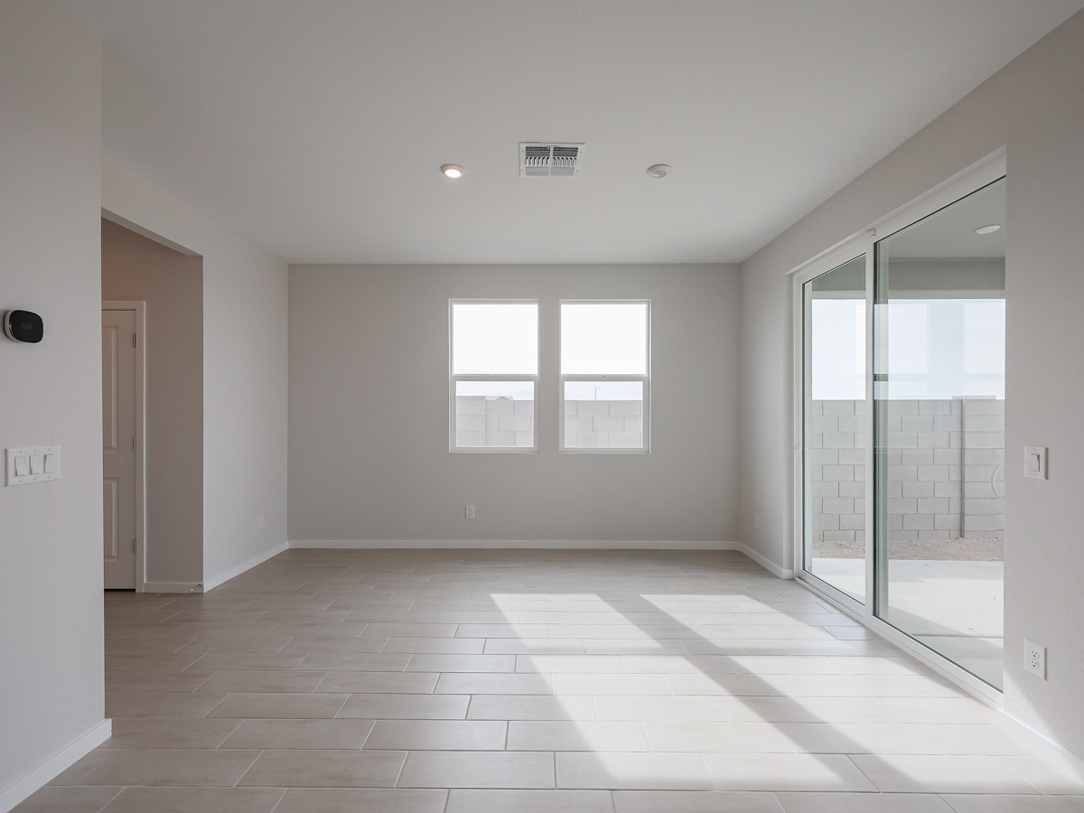 A room with a glass door and a glass door.