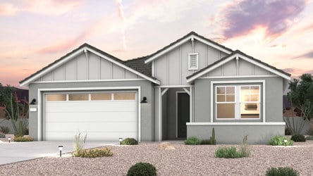 Twilight rendering of front of new home for sale in Buckeye, AZ with 2 car garage.