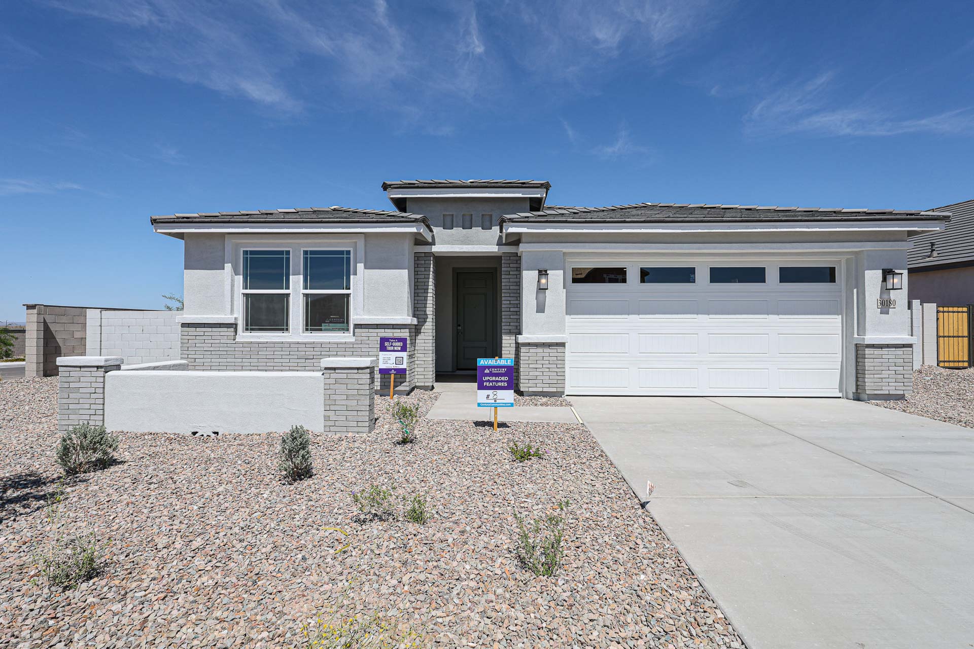 A building with a sign in front.