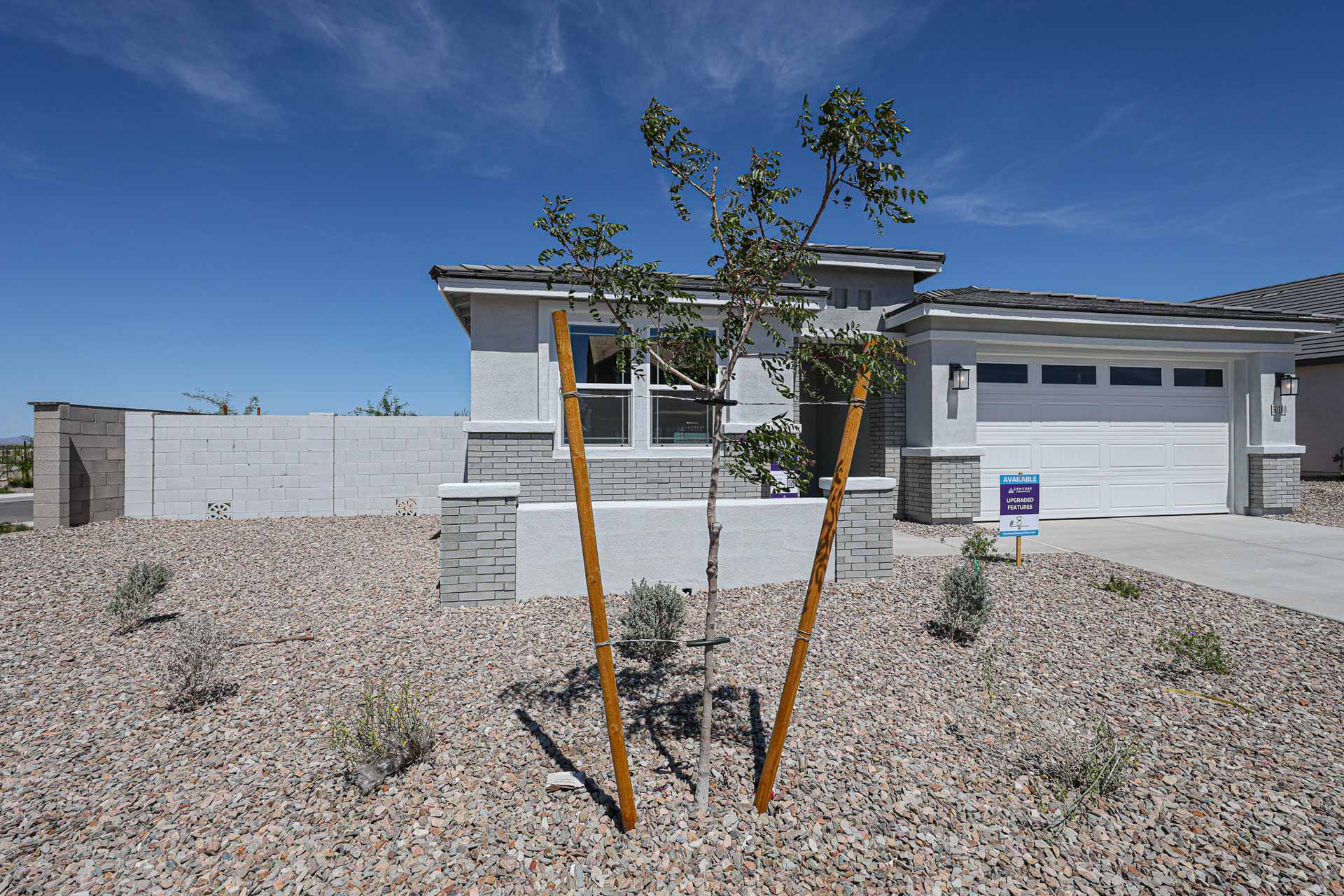 A building with a few trees in front of it.