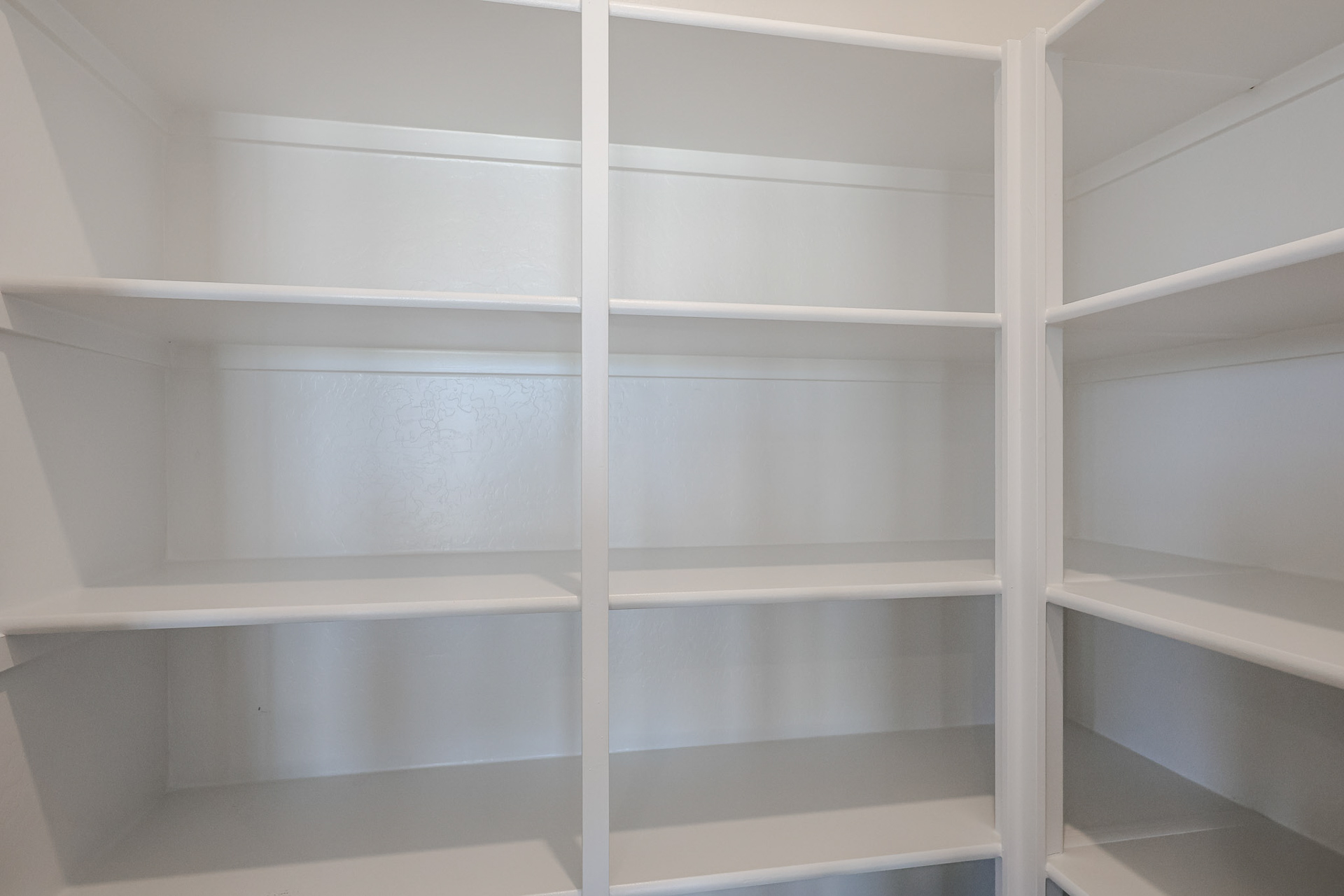 A white shelf with white shelves.