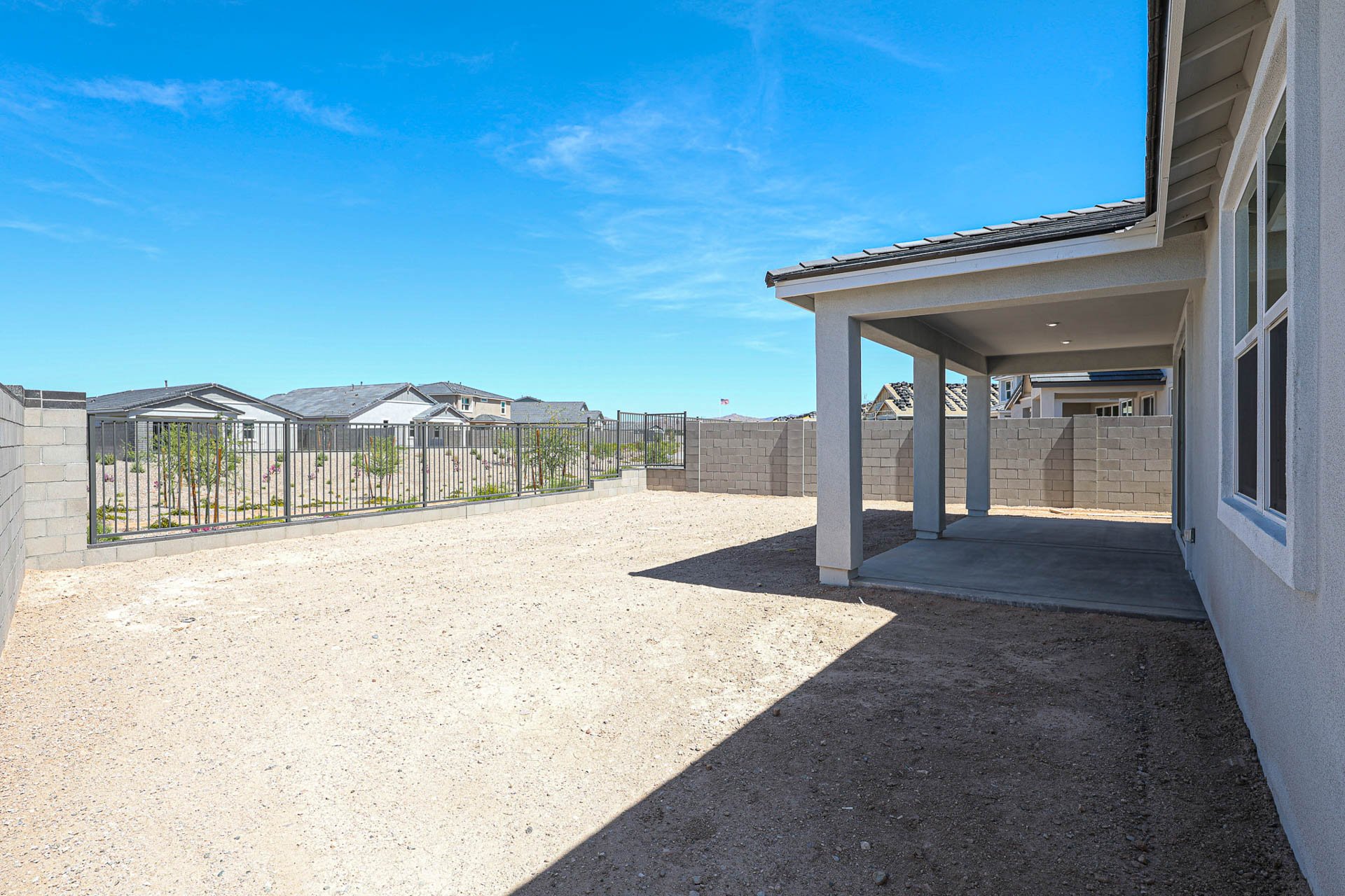 A fenced in driveway.