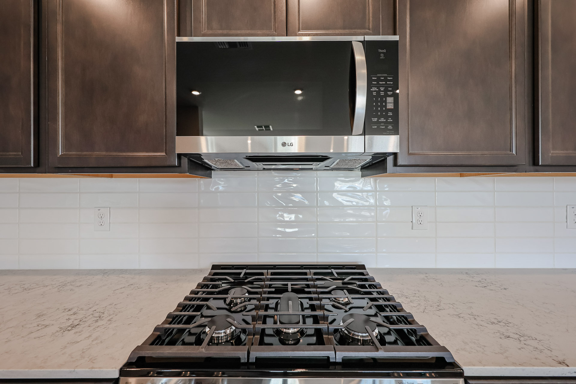 A kitchen with a stove and oven.