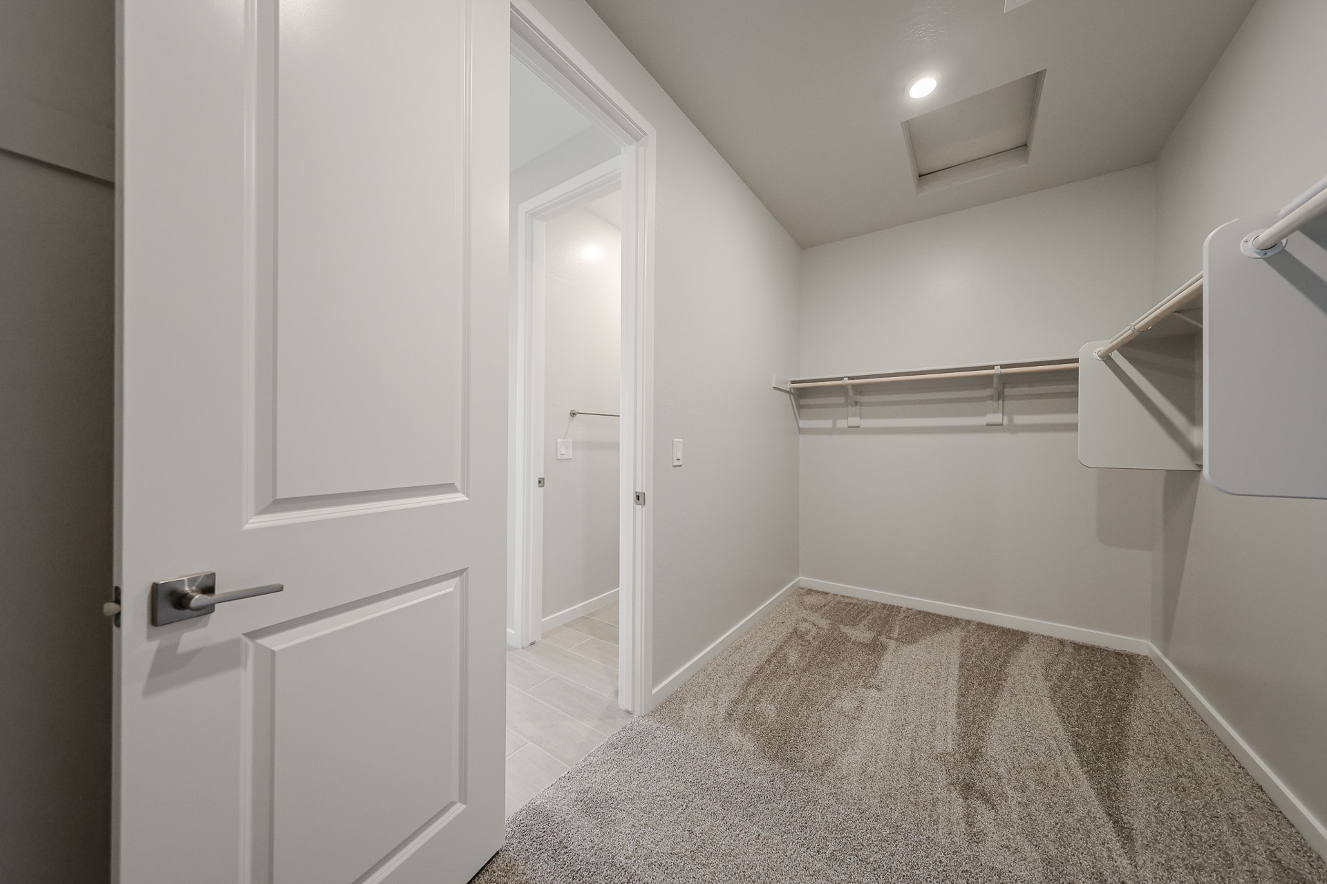 A room with white doors.