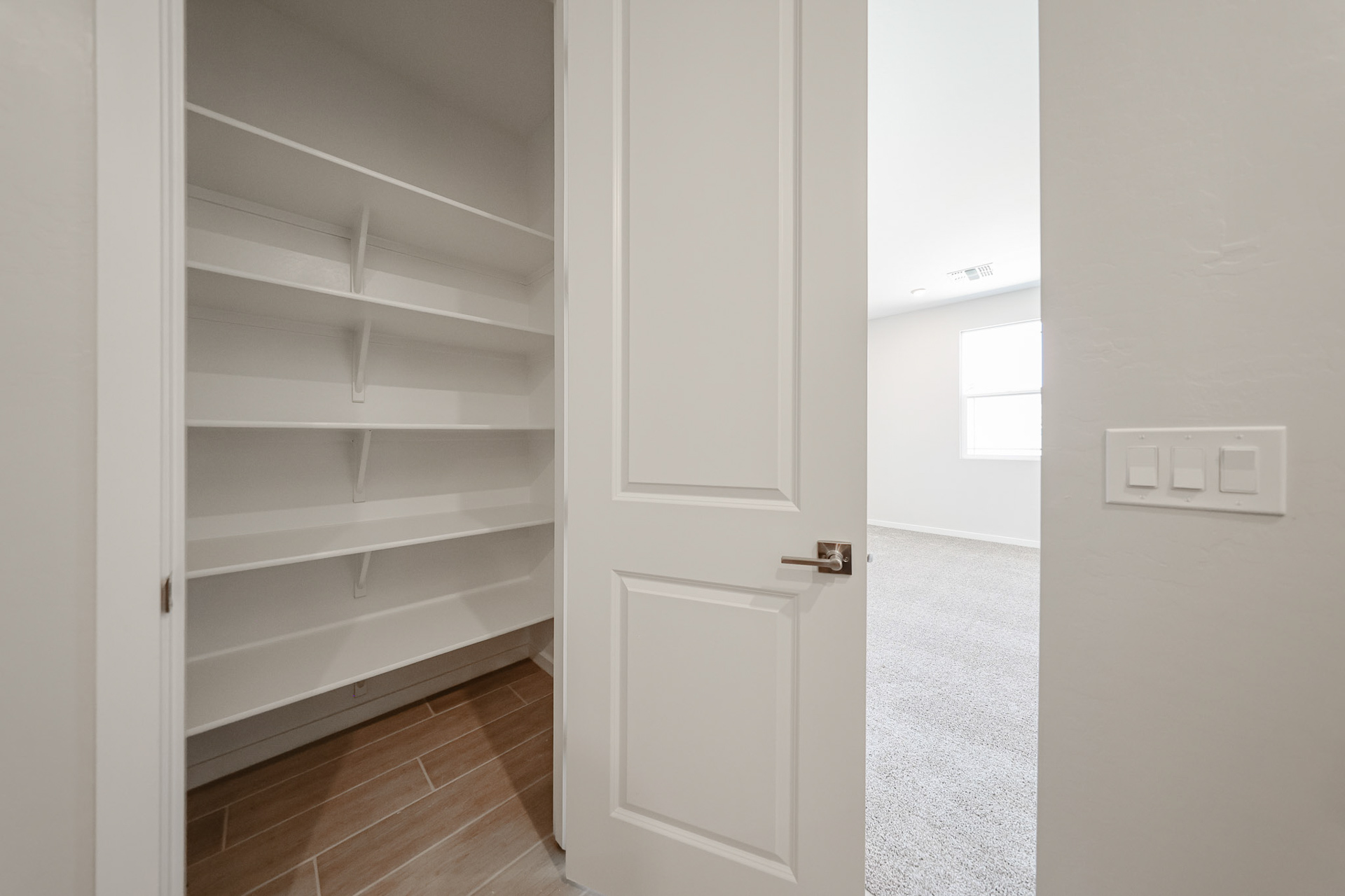A white door in a room.