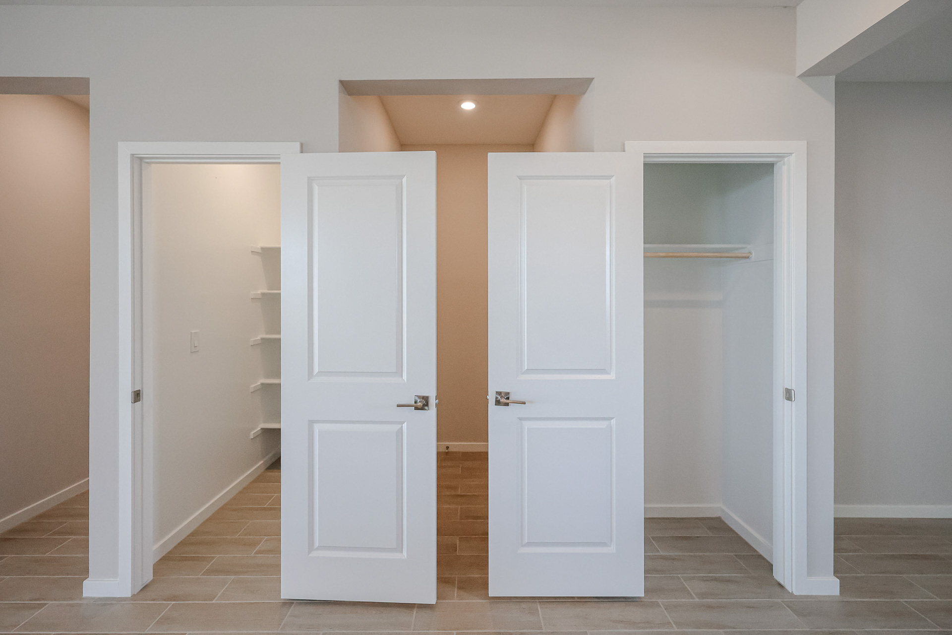 A room with white doors.