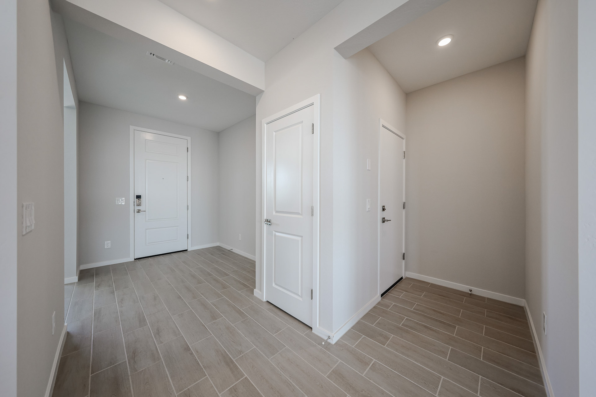 A room with white doors.