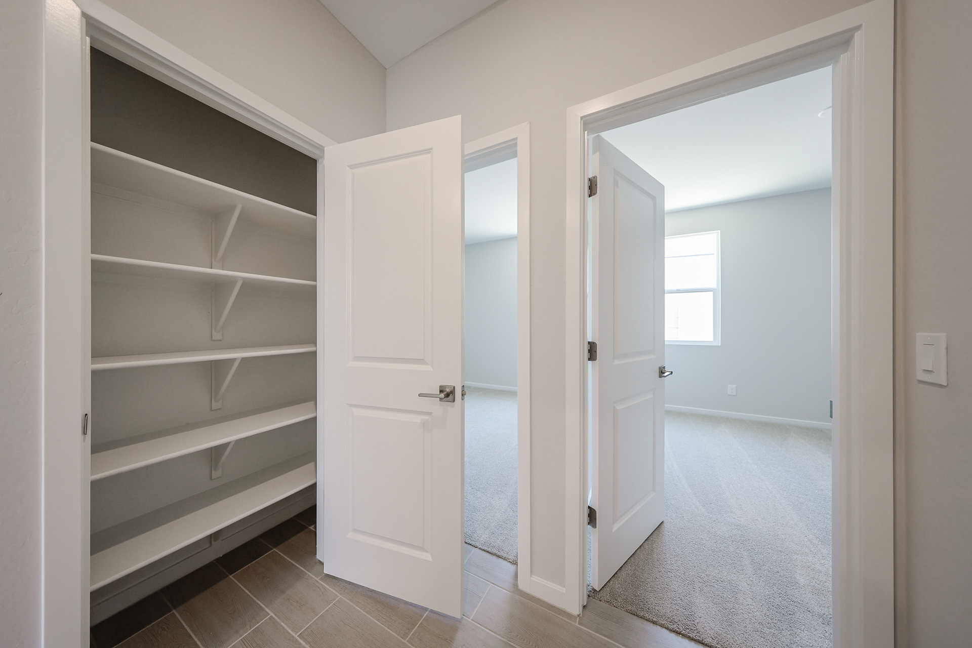 A room with white doors.