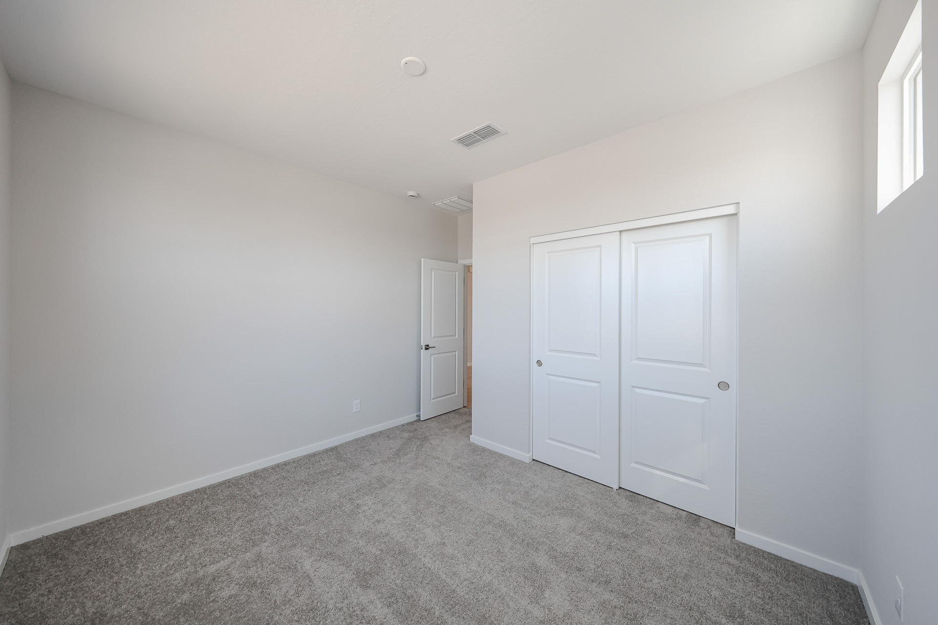 A room with white doors.