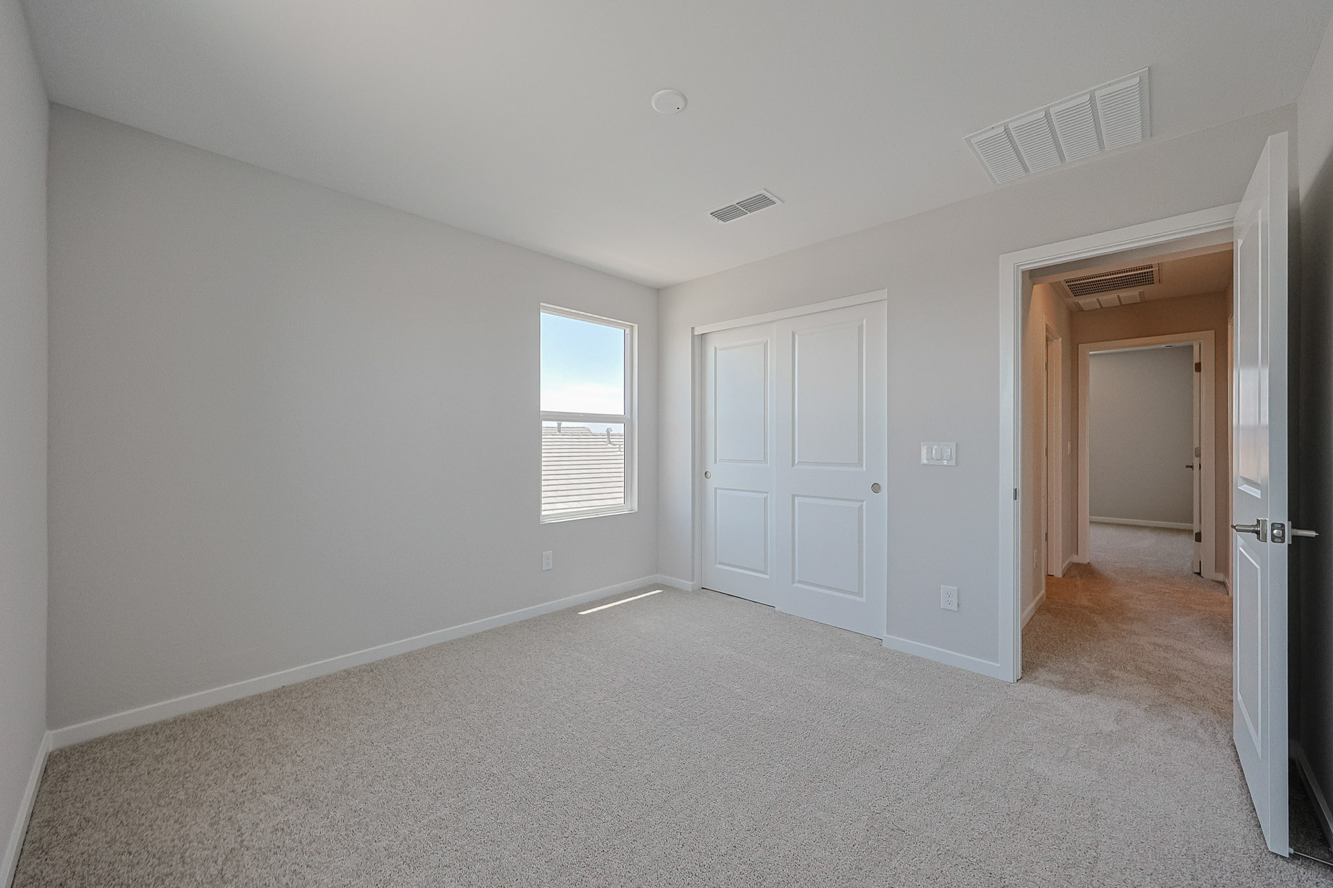 A room with white doors.