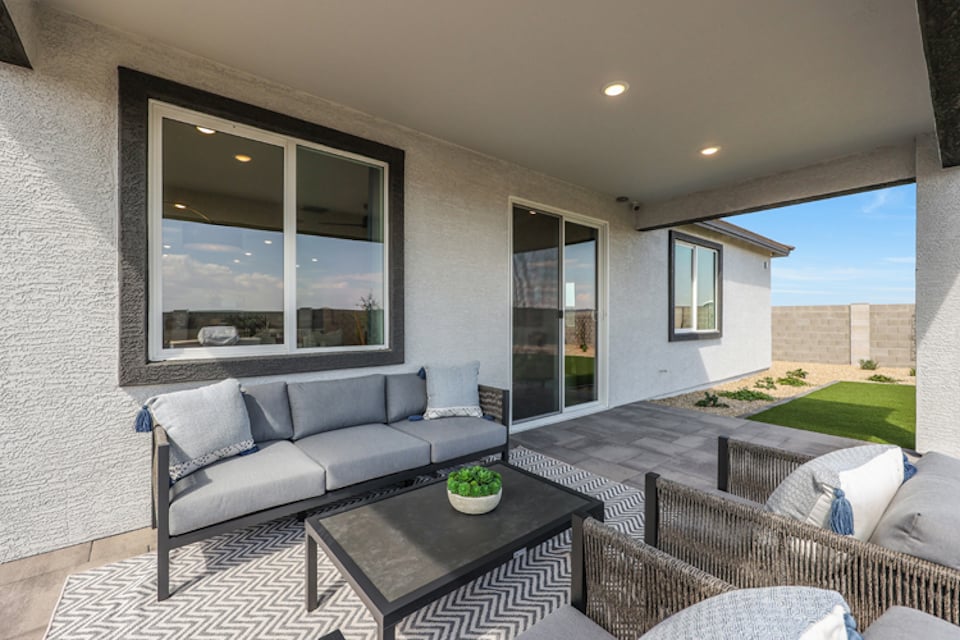 A modern living room with a large window.