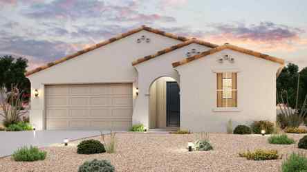 A house with a garage and a driveway.