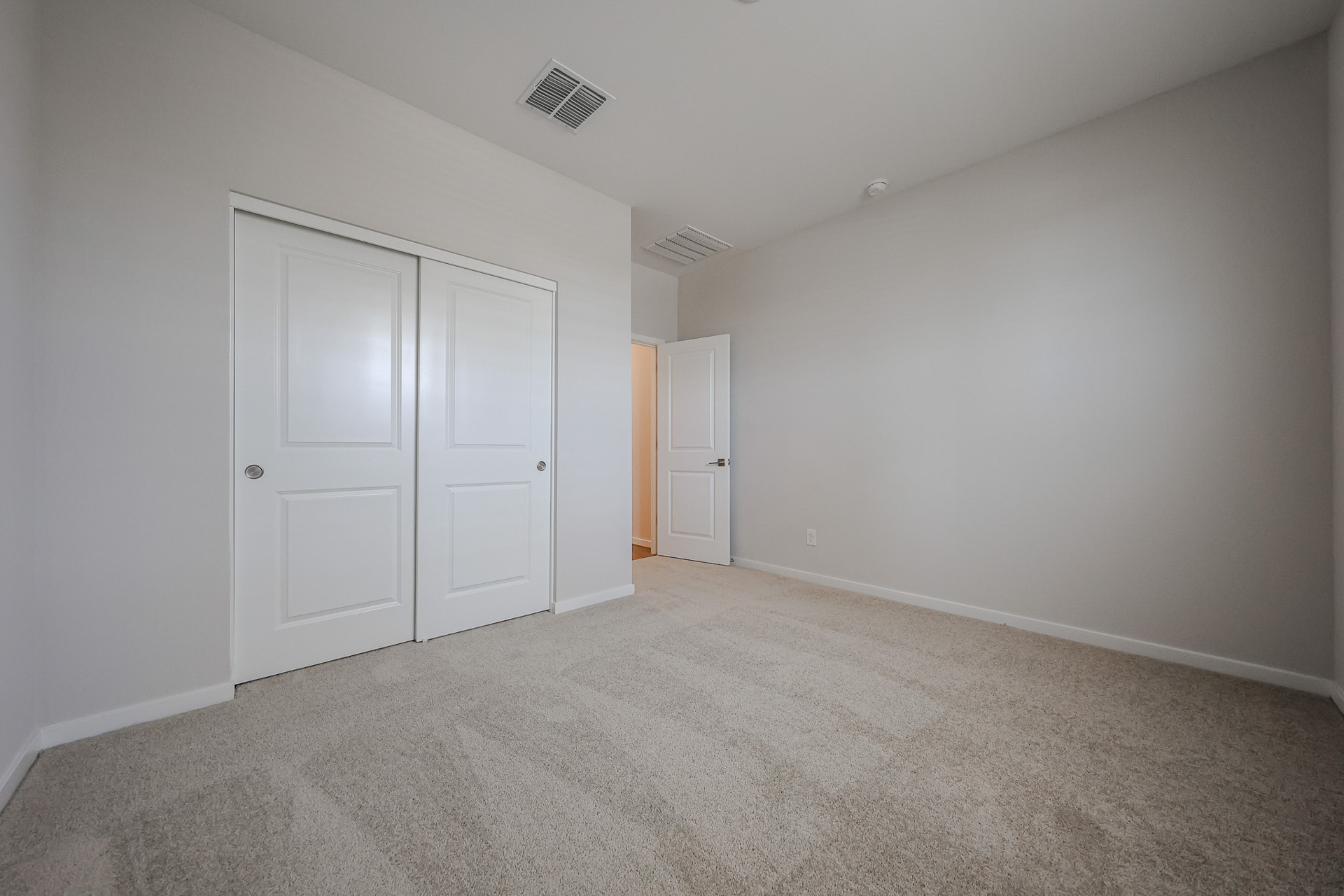 A room with white doors.