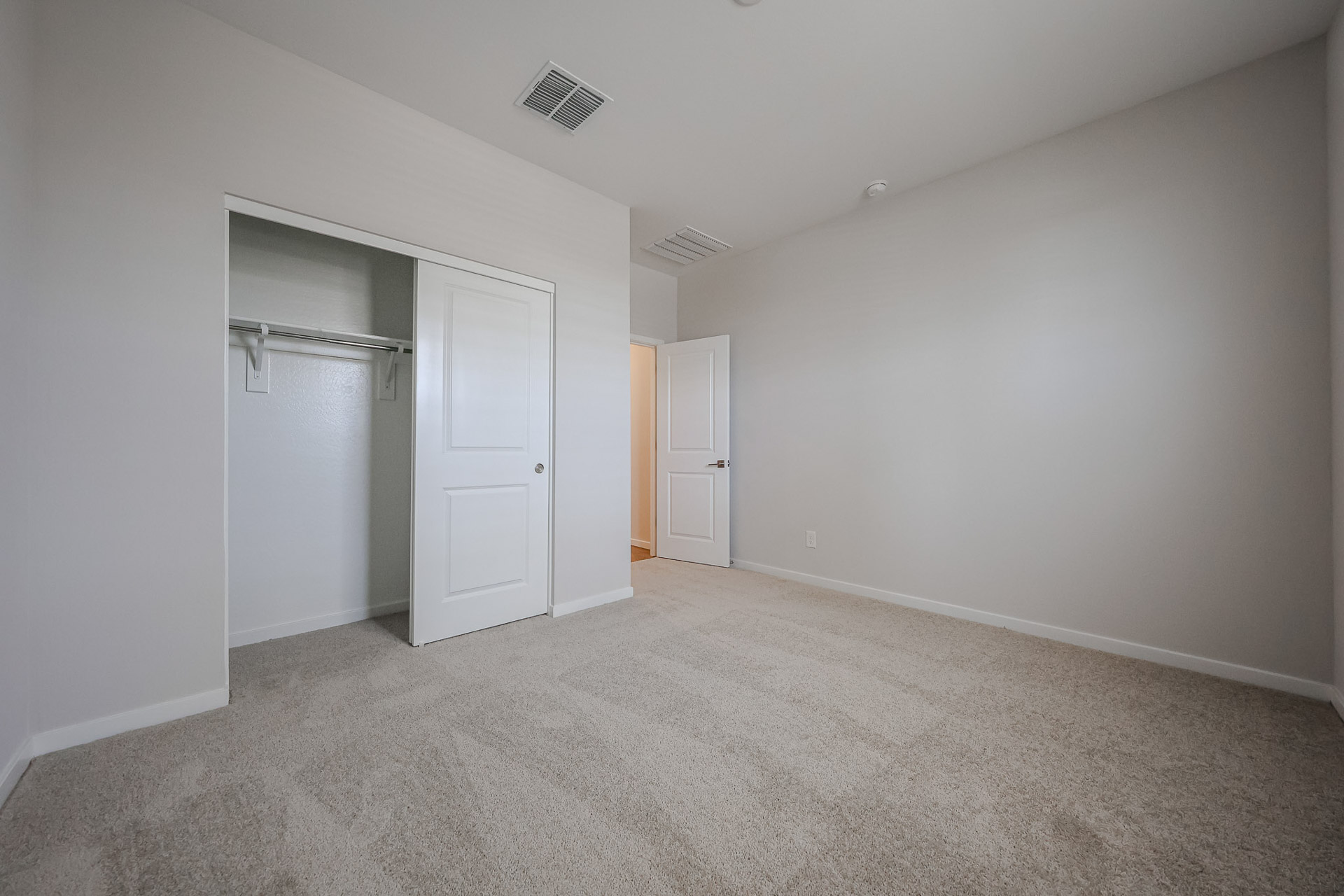 A room with white doors.