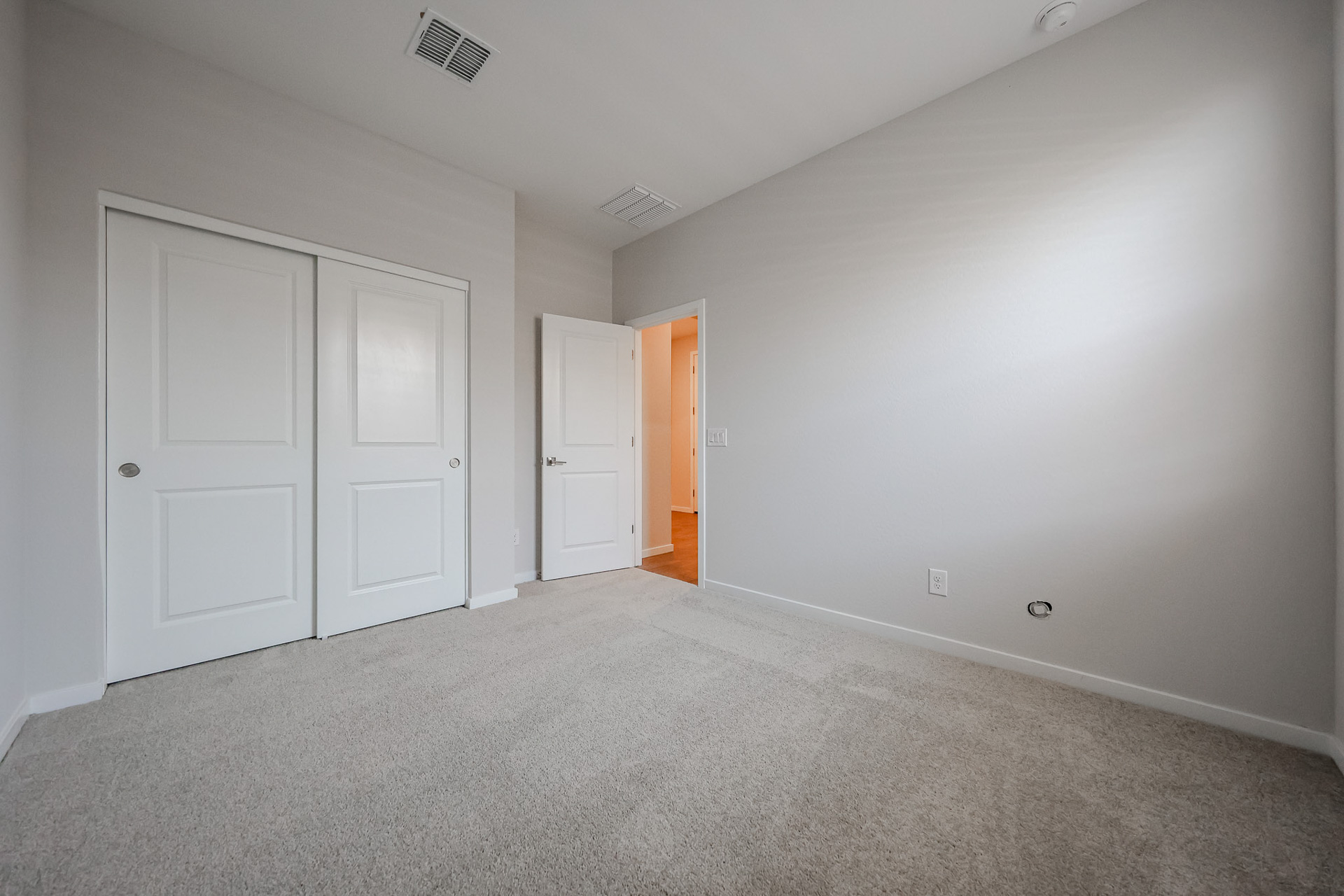 A room with white doors.