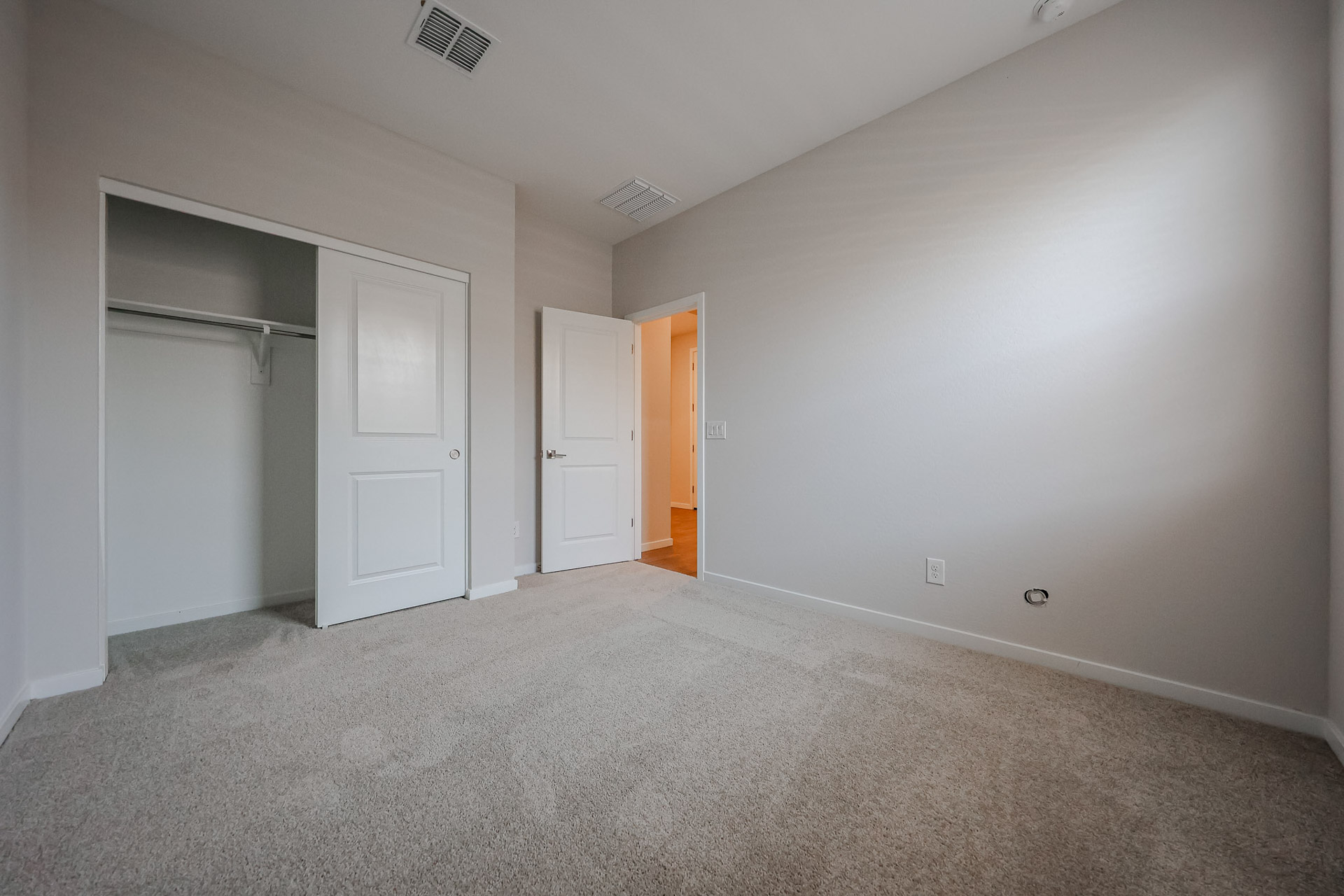 A room with white doors.