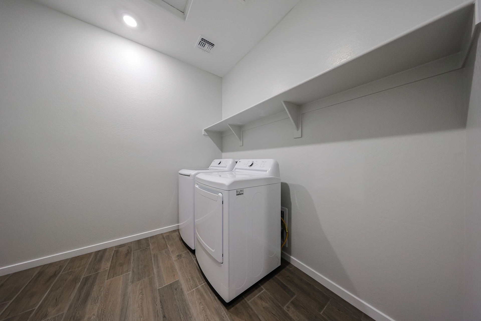 A white machine in a room.