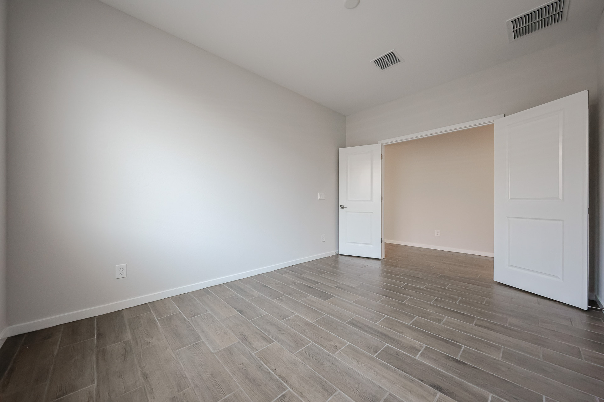 A room with white doors.