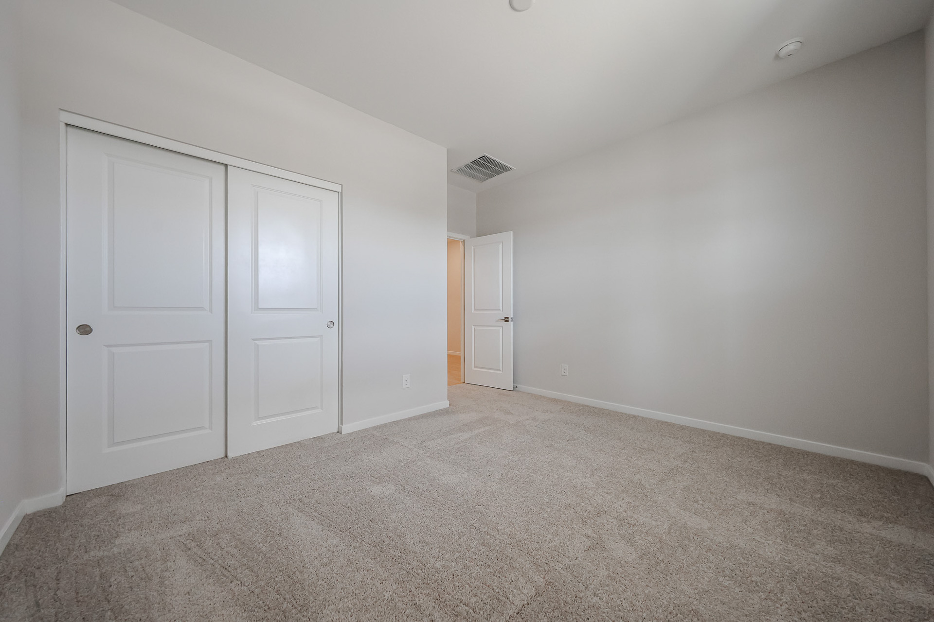 A room with white doors.