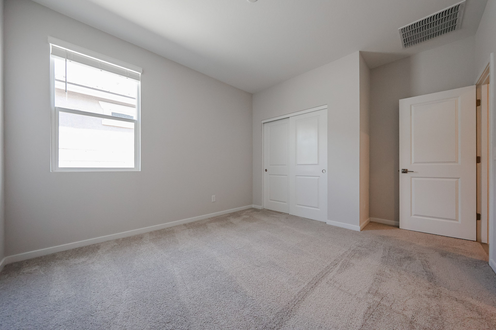 A room with white doors.