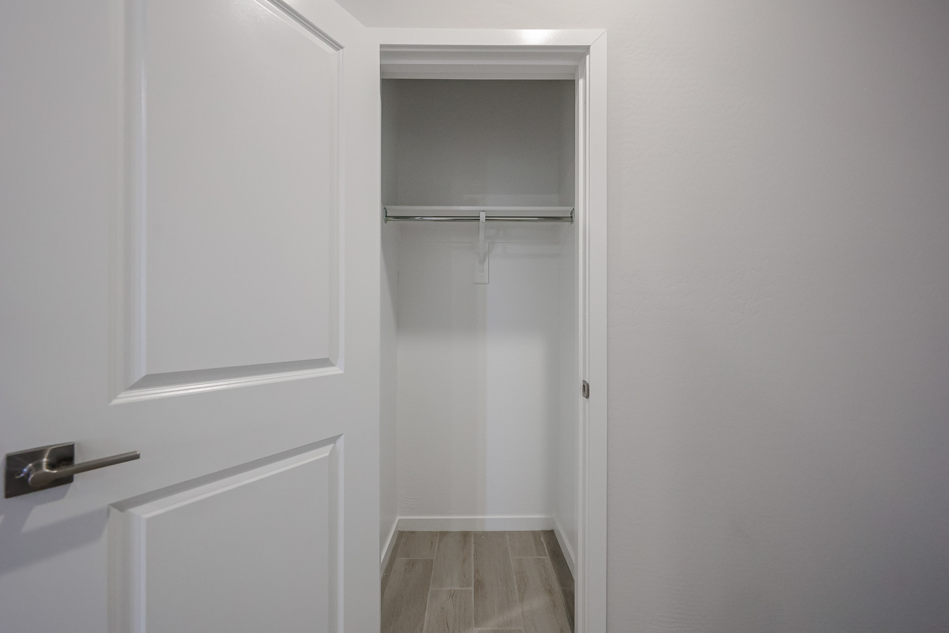 A white door with a glass window.