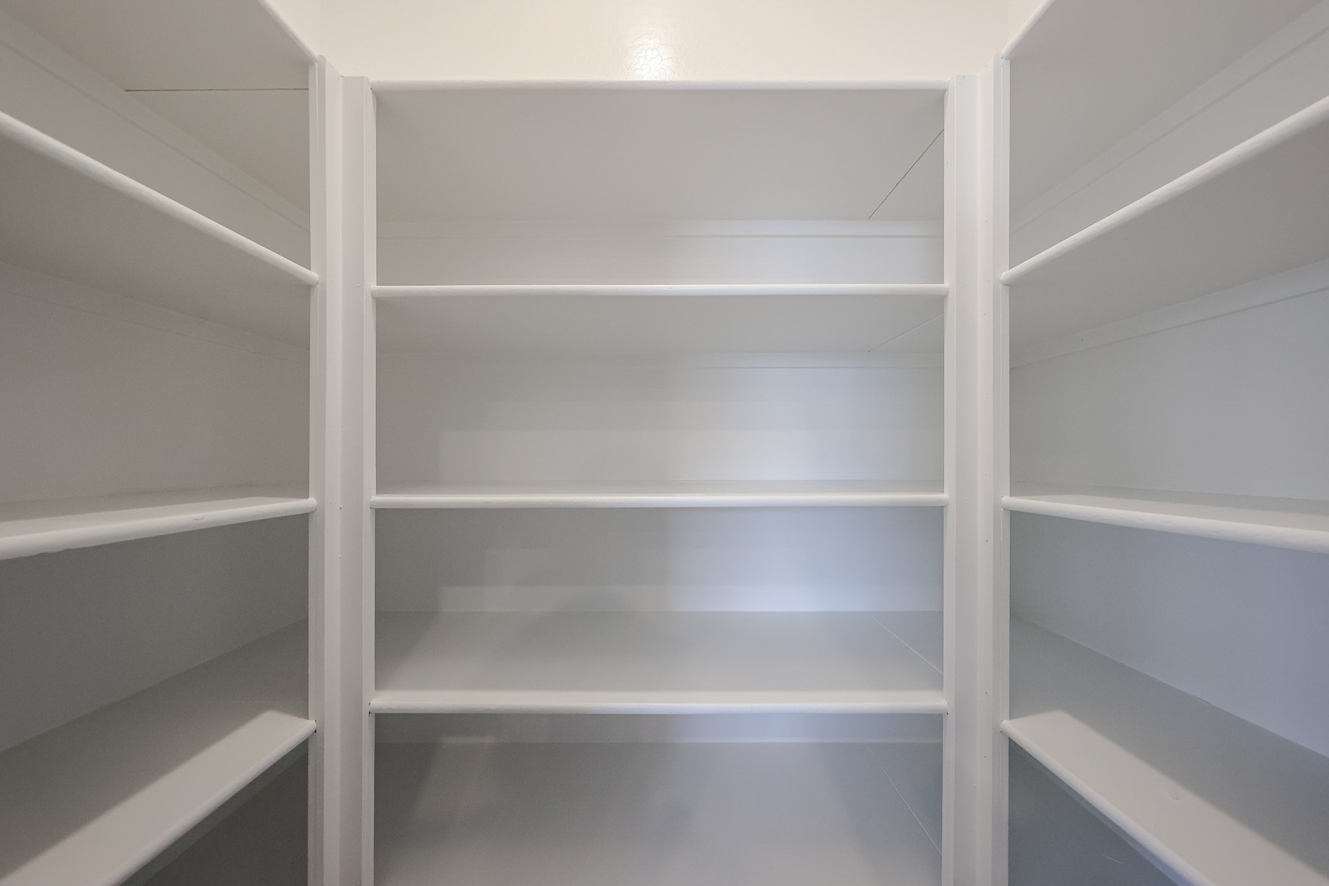 A white shelf with white shelves.