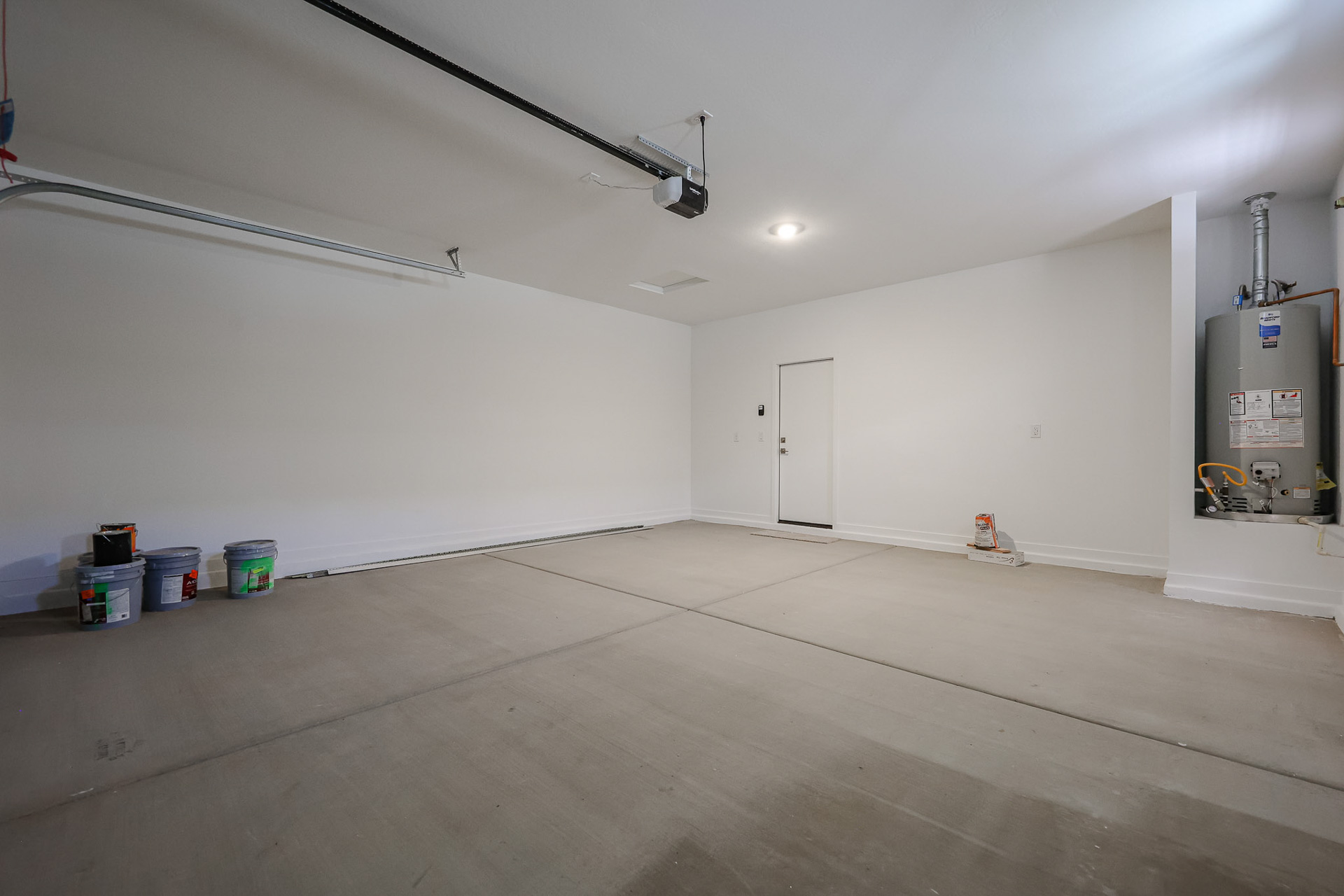 A room with a white wall and a white floor.
