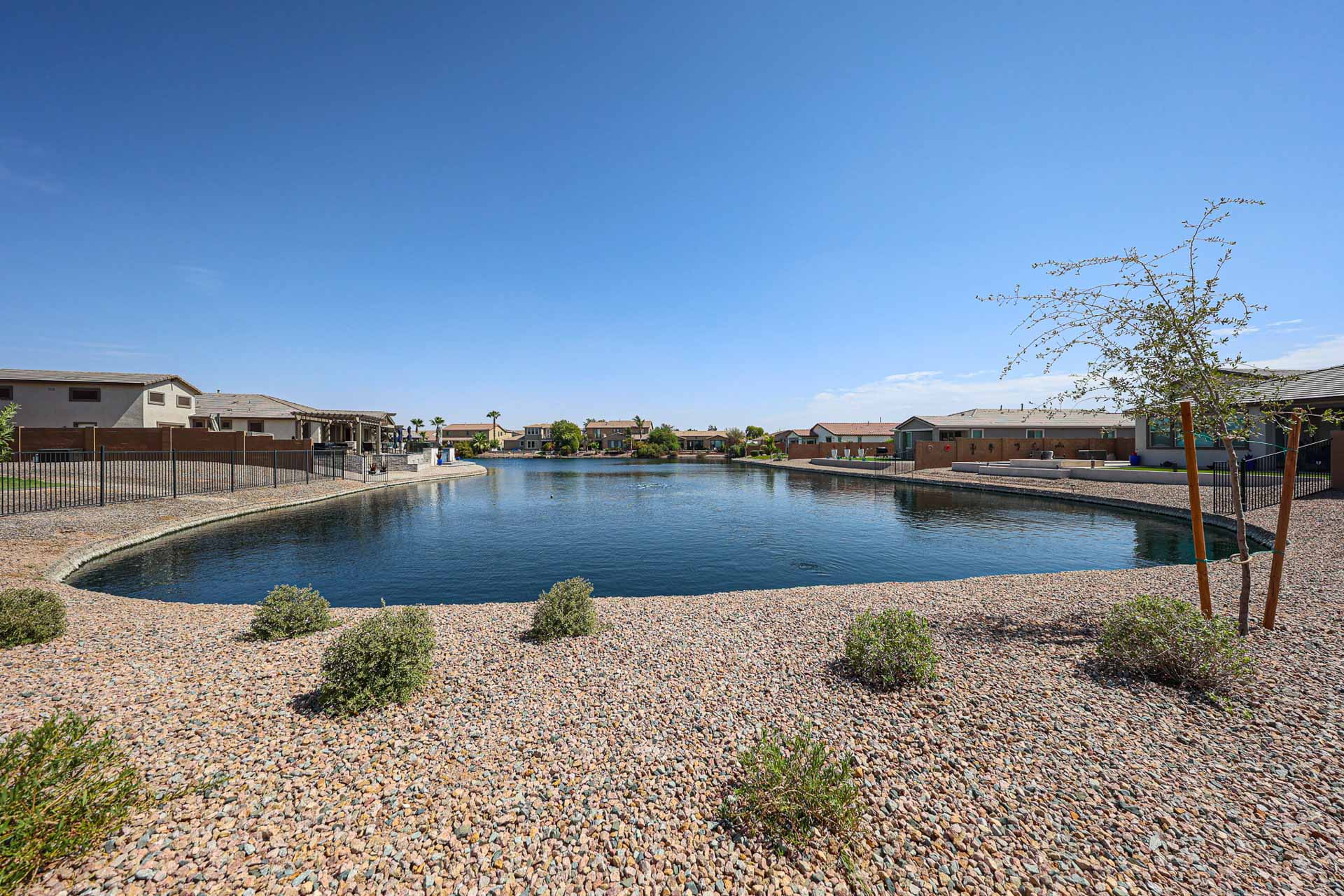 A body of water with buildings around it.