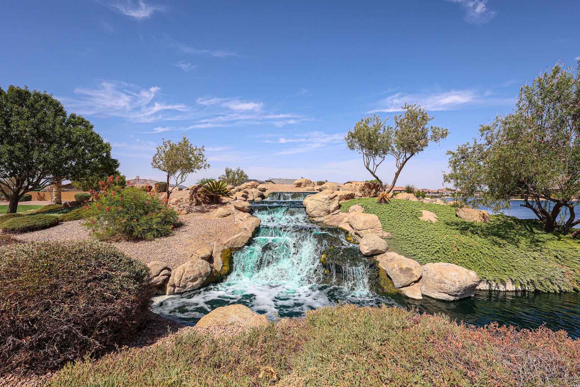 A small waterfall in a park.