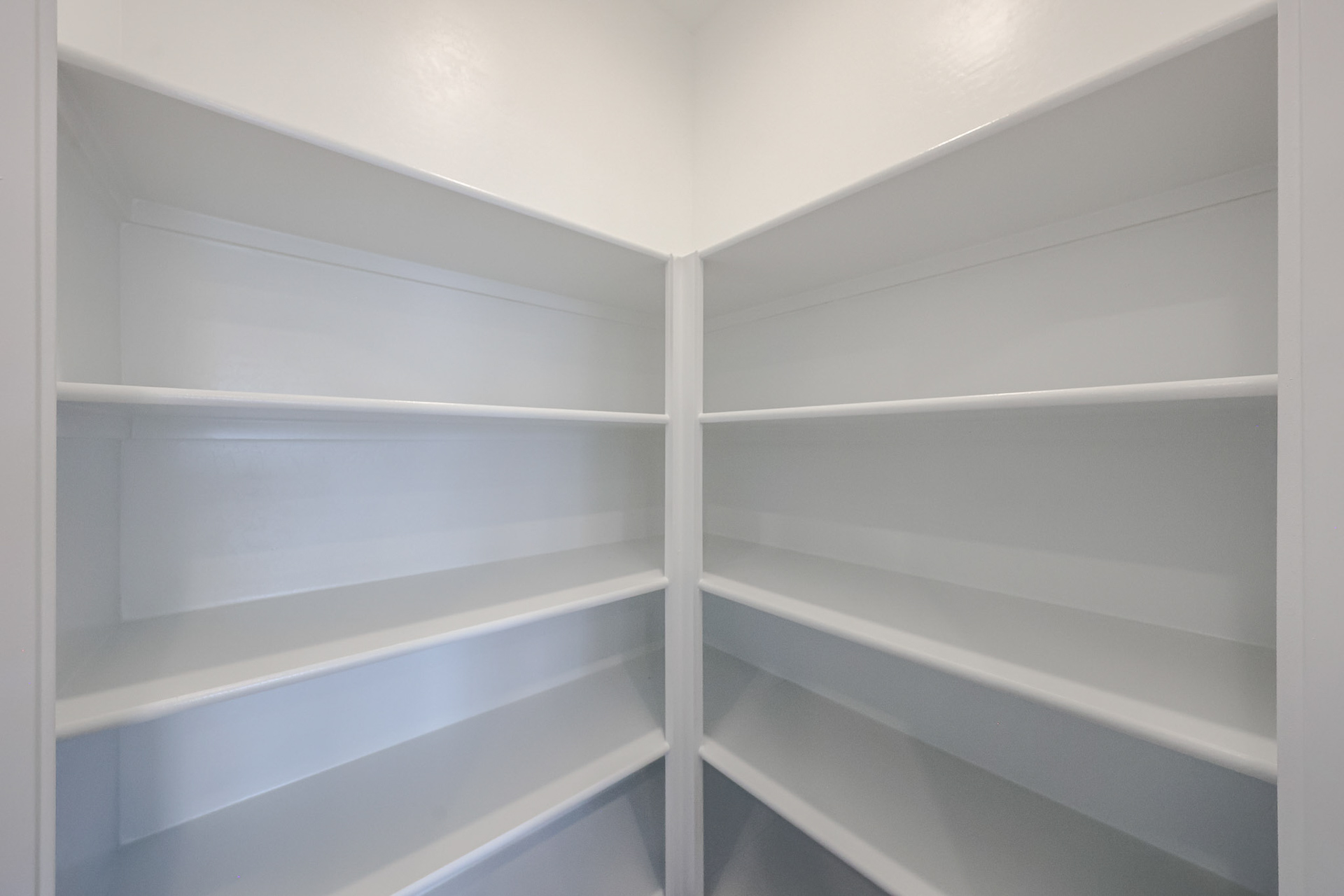 A white shelf with white shelves.