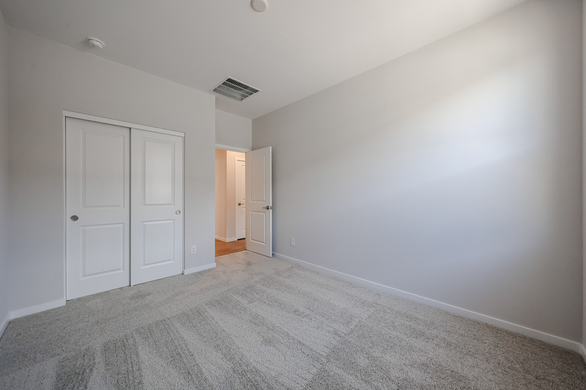 A room with white doors.