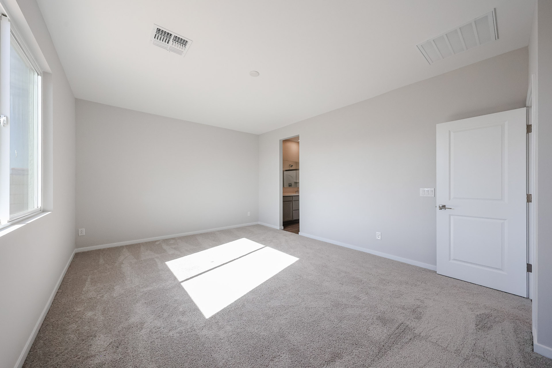 A room with white doors.