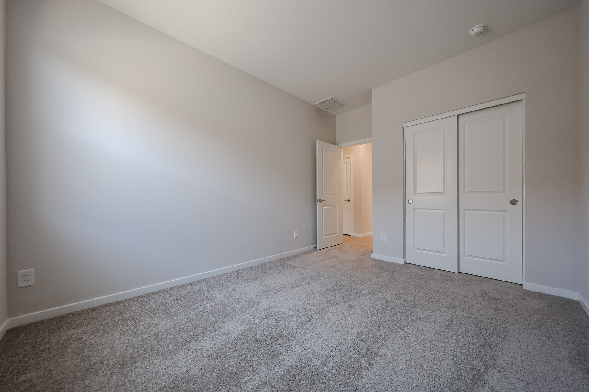 A room with white doors.