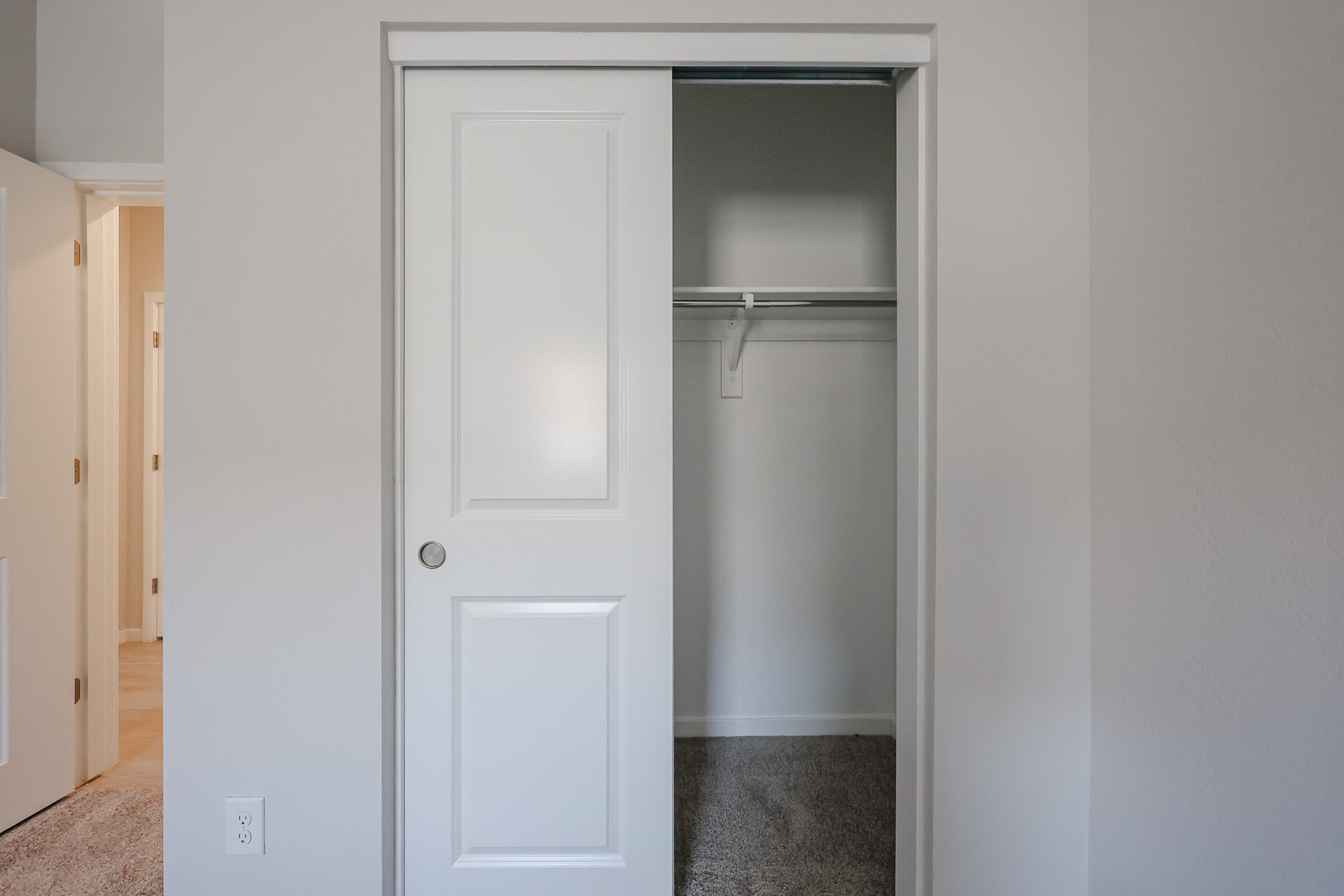 A white door with a glass window.
