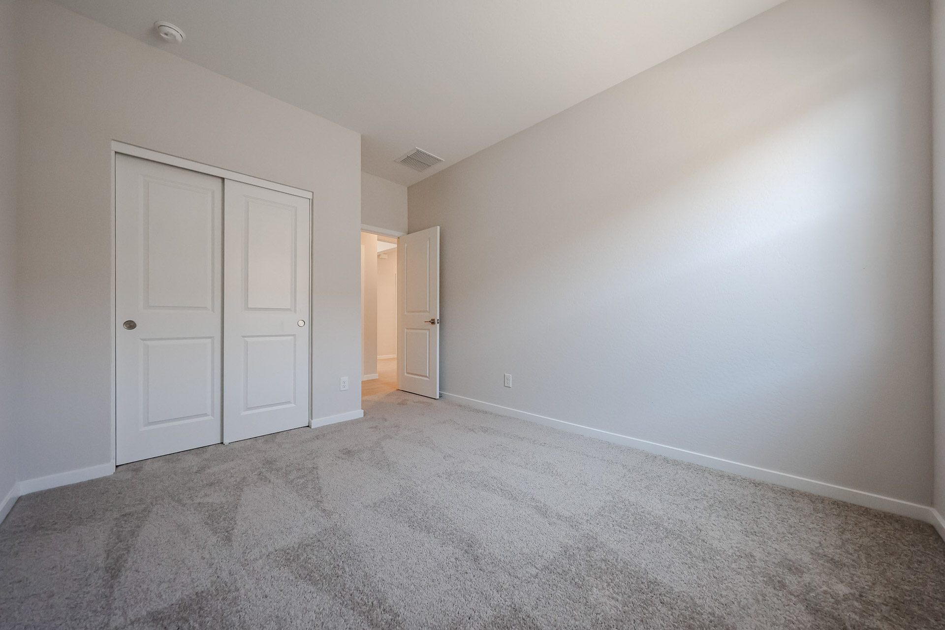 A room with white doors.
