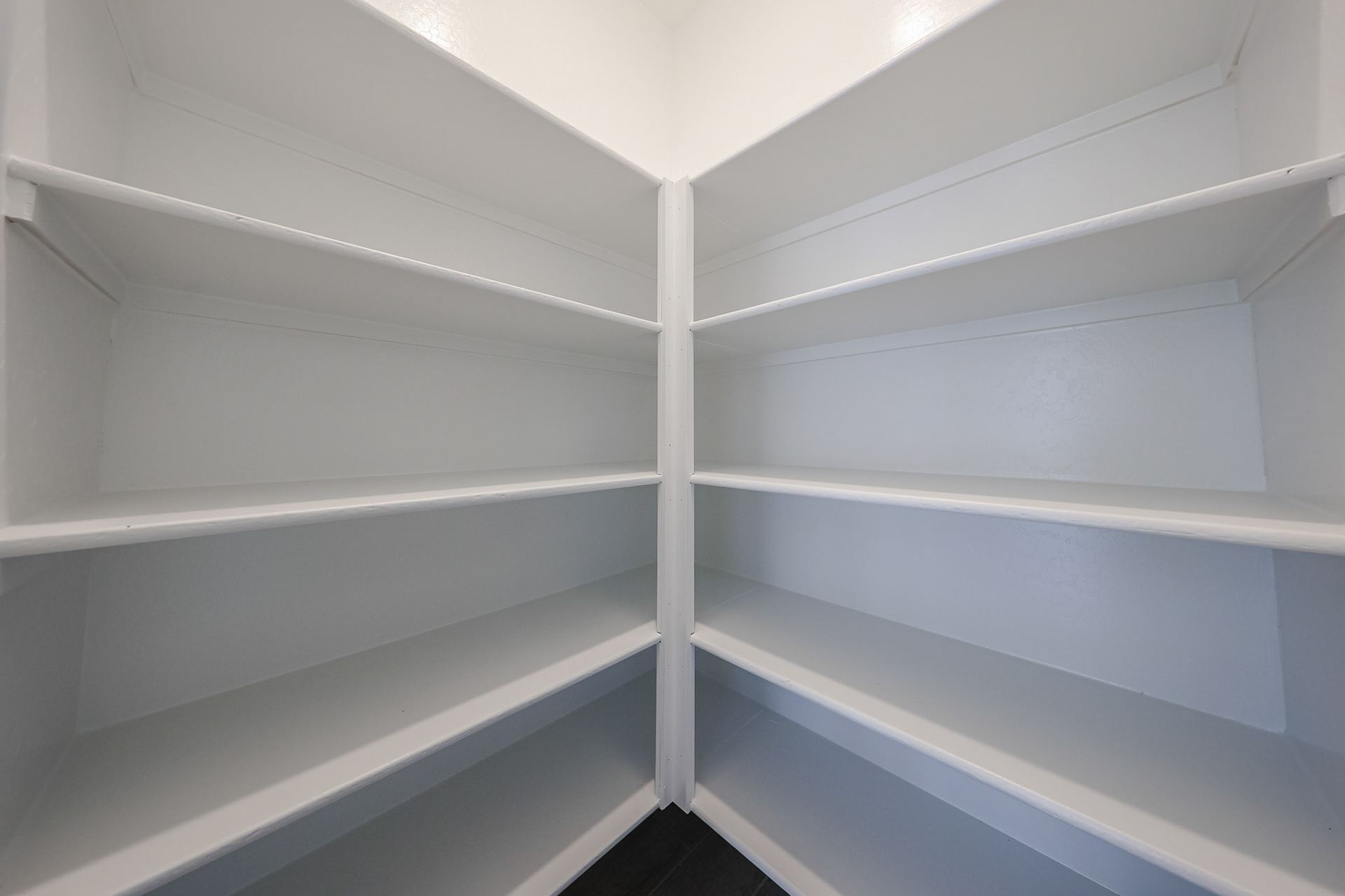 A white shelf with white shelves.