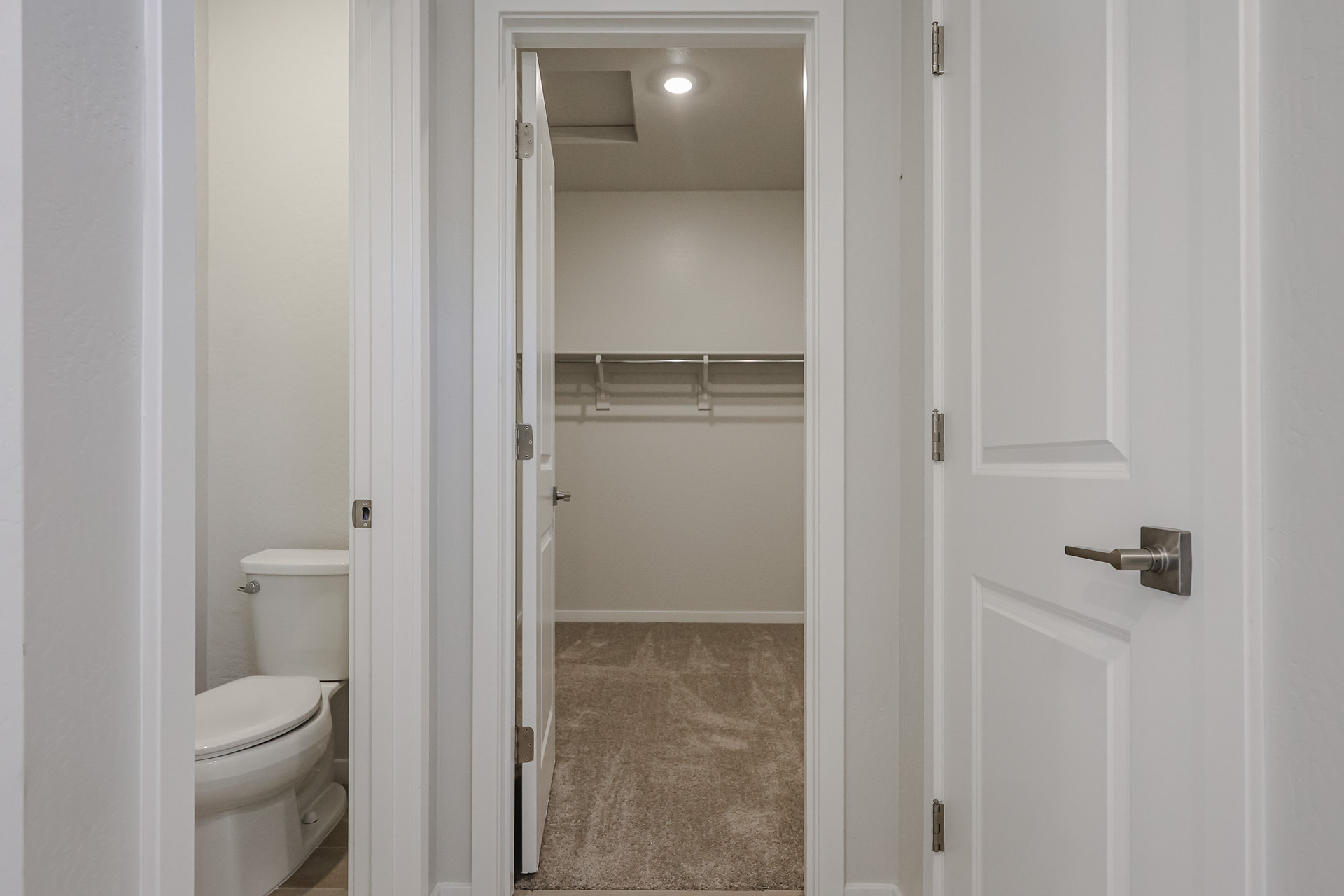 A bathroom with a shower unit.
